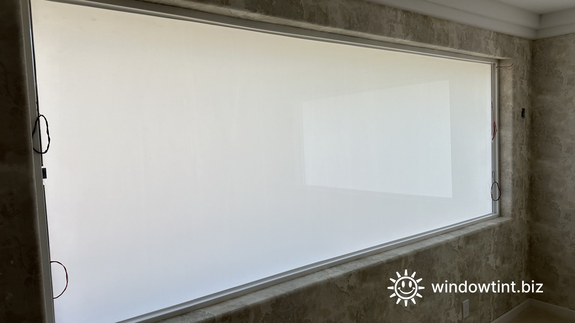 Residential smart tint installation showing frosted privacy glass with power turned off