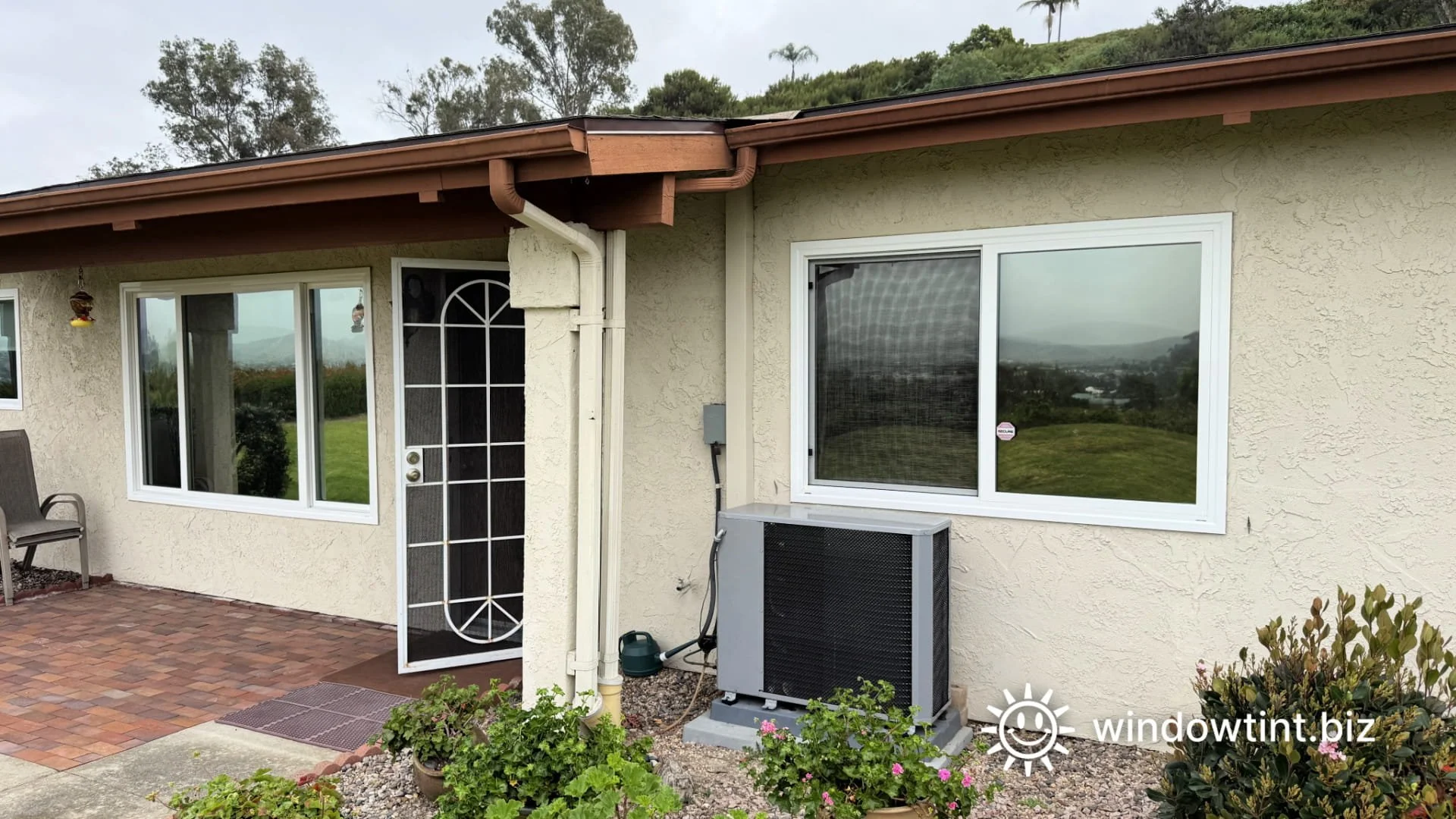 Residential window tint providing UV protection for floors and furniture in an Oceanside home.