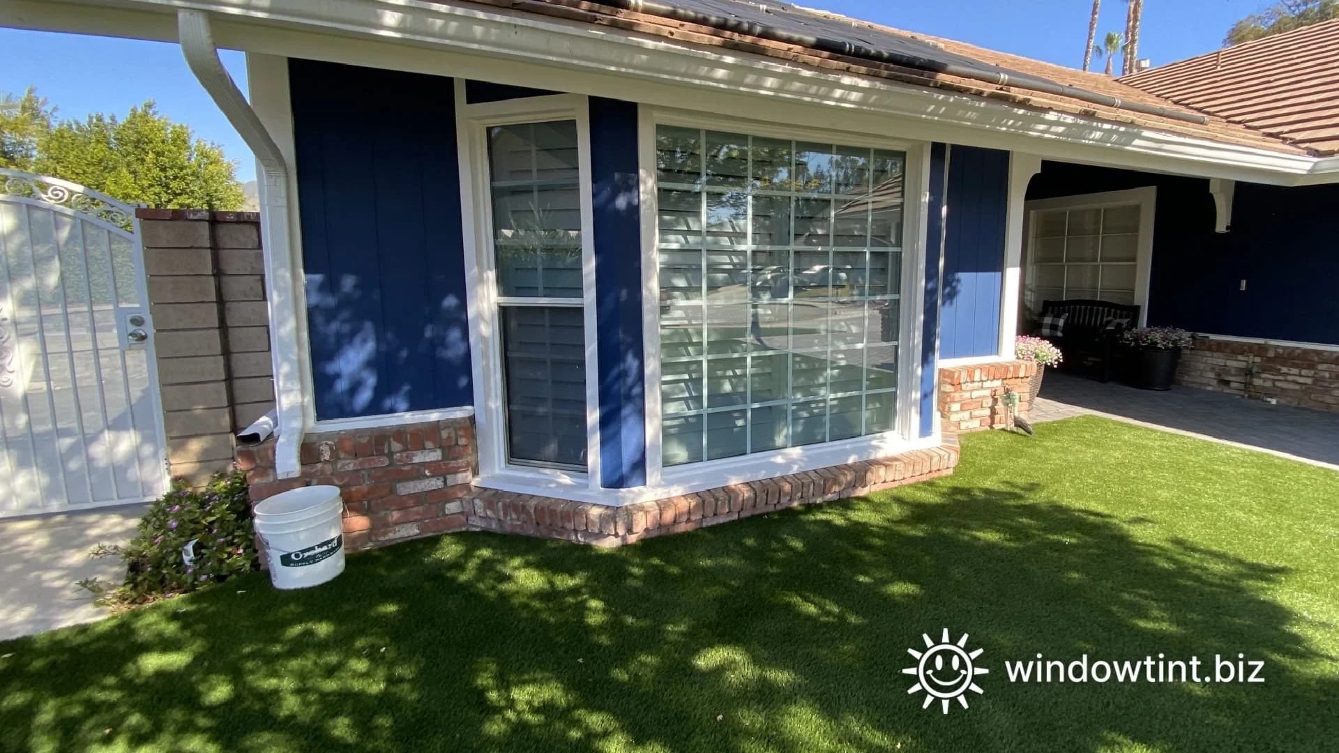 Sun-exposed home windows in La Verne, California before residential window tint installation.