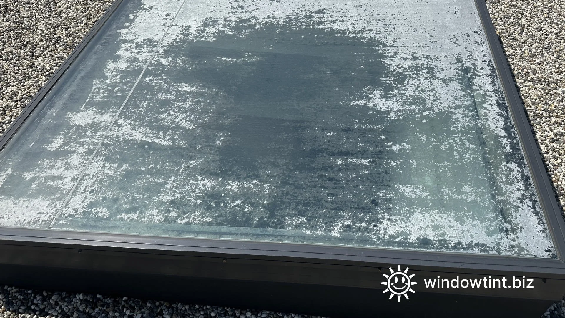 Old cracked skylight window film failing in a Los Angeles residence before professional removal and replacement.