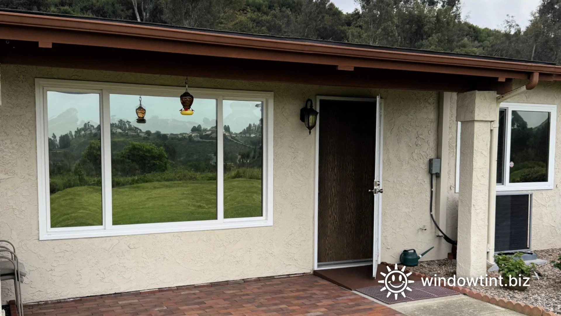 Window film reducing heat and glare inside a sun-exposed Oceanside, California home.
