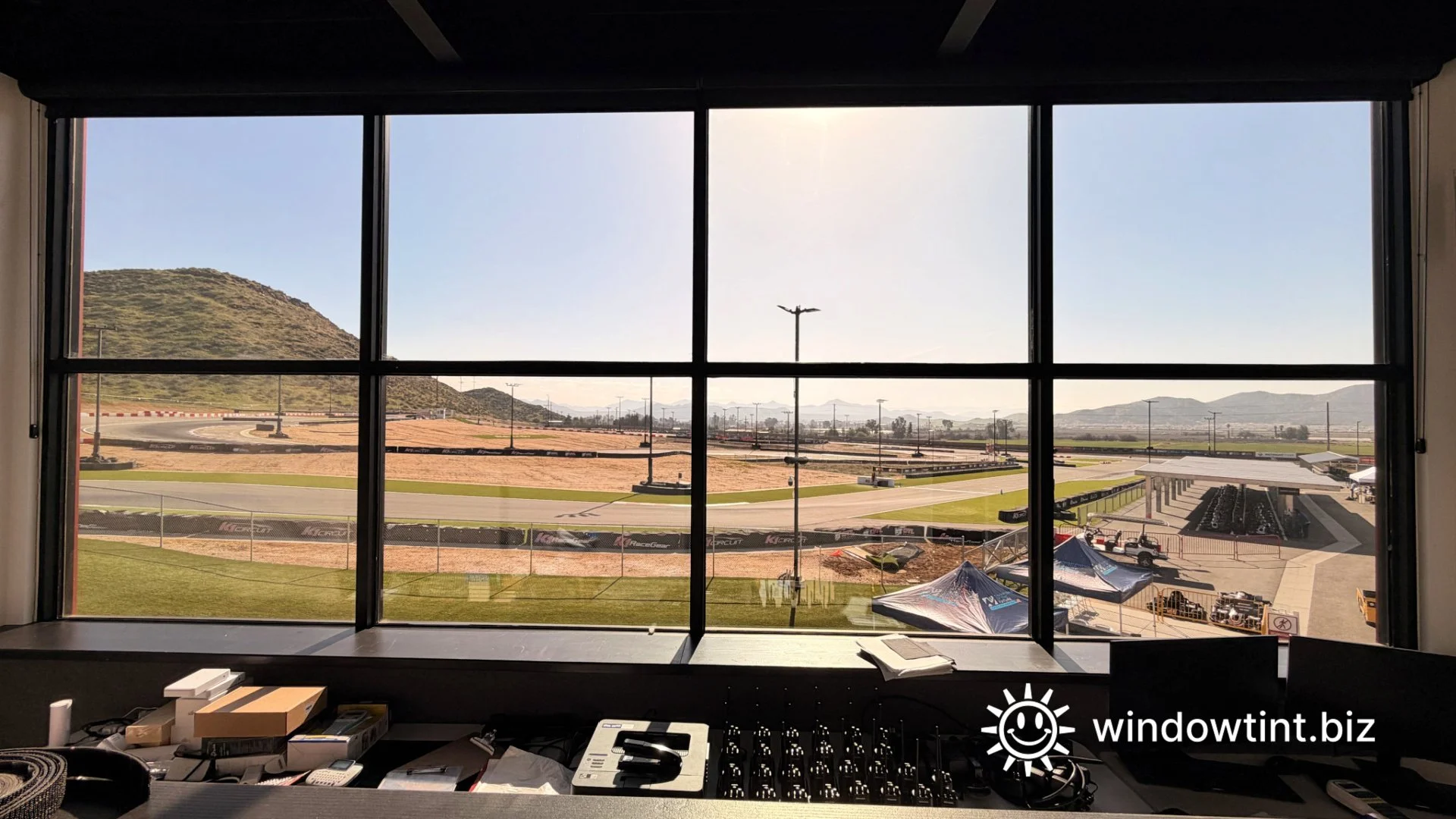 Commercial building with large glass windows before window tinting for heat reduction in Temecula California