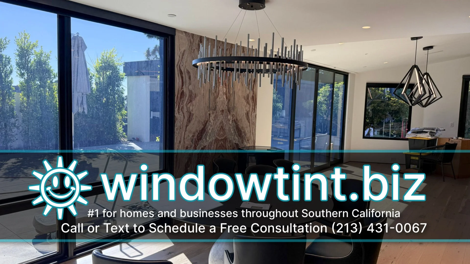 Residential window tint installation on large glass doors in Newport Beach