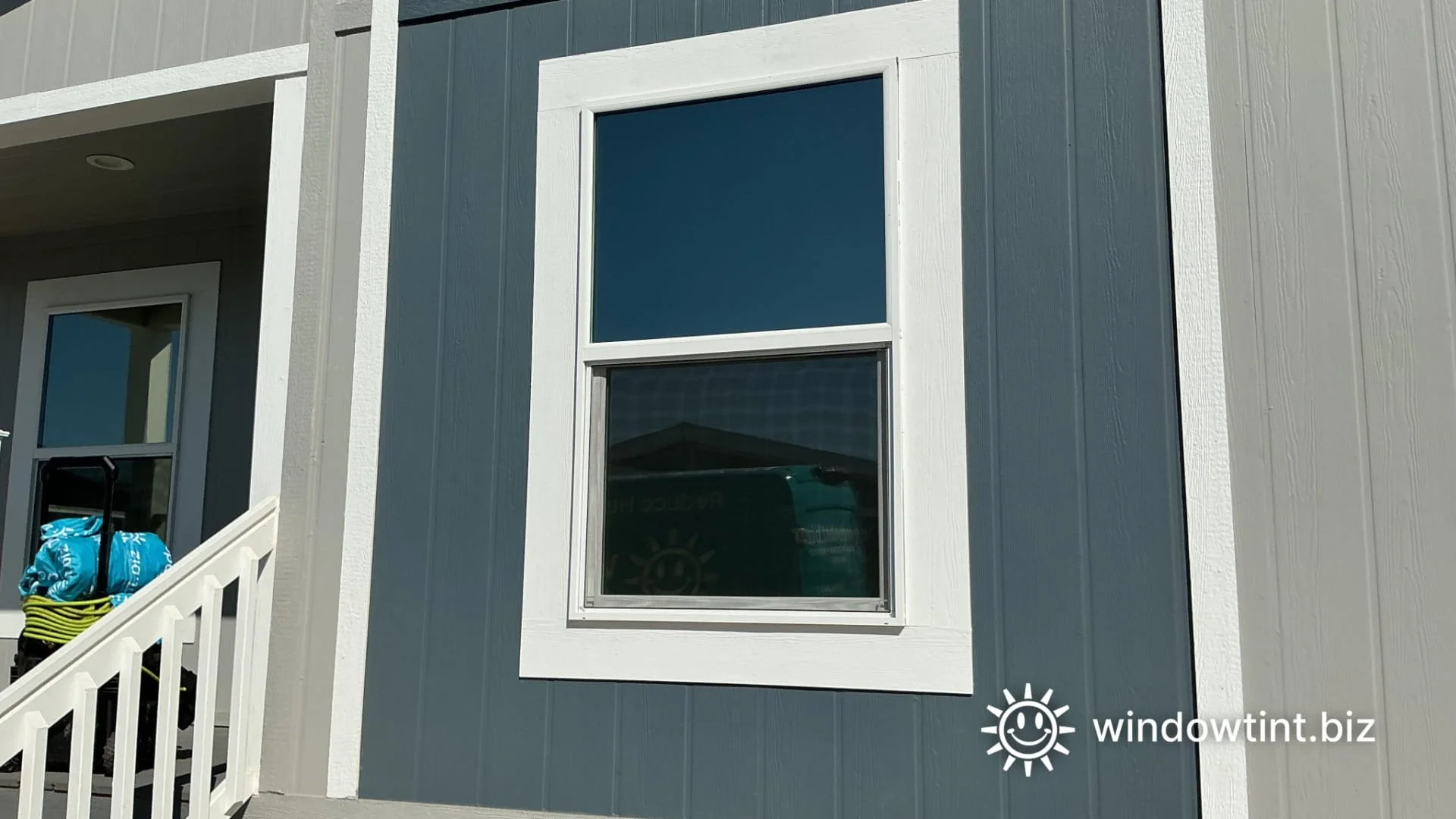 house window tint Hemet CA exterior showing privacy glass and darker window appearance