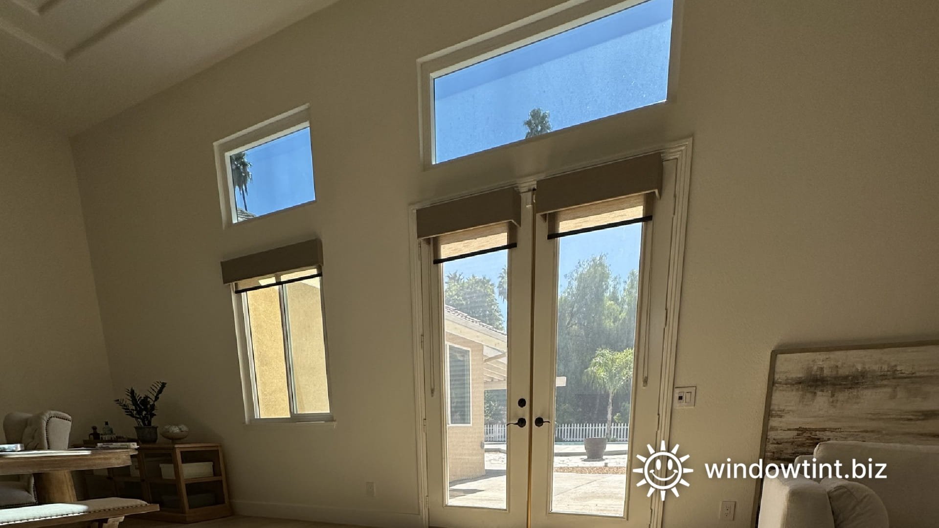 Sunlight entering a Corona, CA home through large windows causing interior heat buildup and glare before window film installation.
