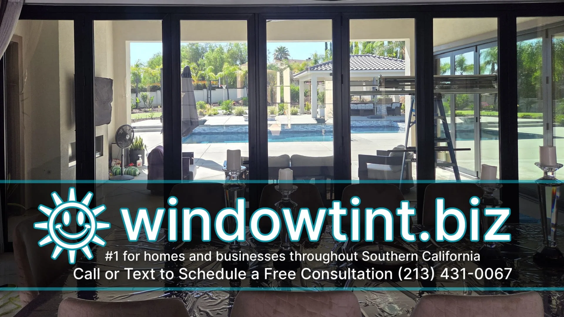 Residential window tinting in Riverside CA on large dining room patio doors facing a backyard pool