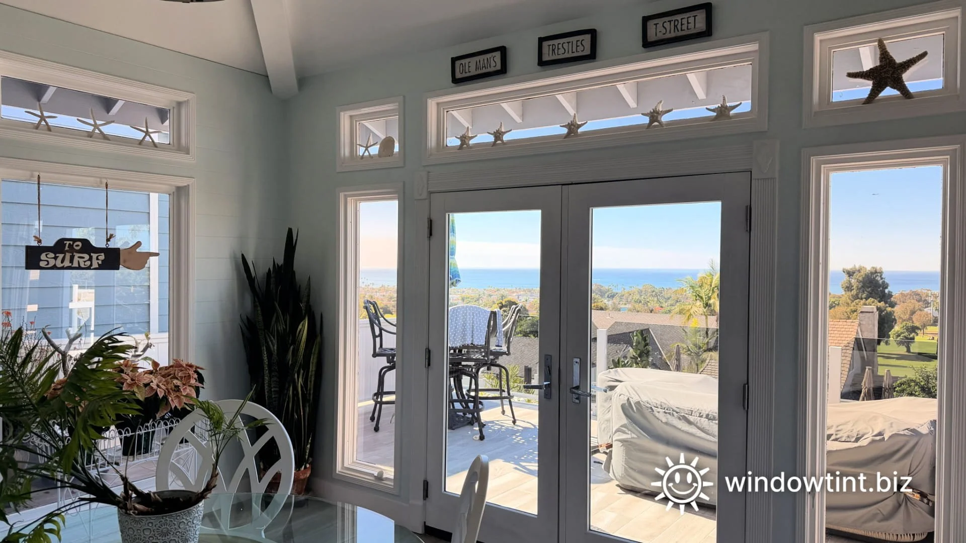 French doors with sidelights and ocean view in San Clemente home, improved with solar control window film to reduce heat and glare