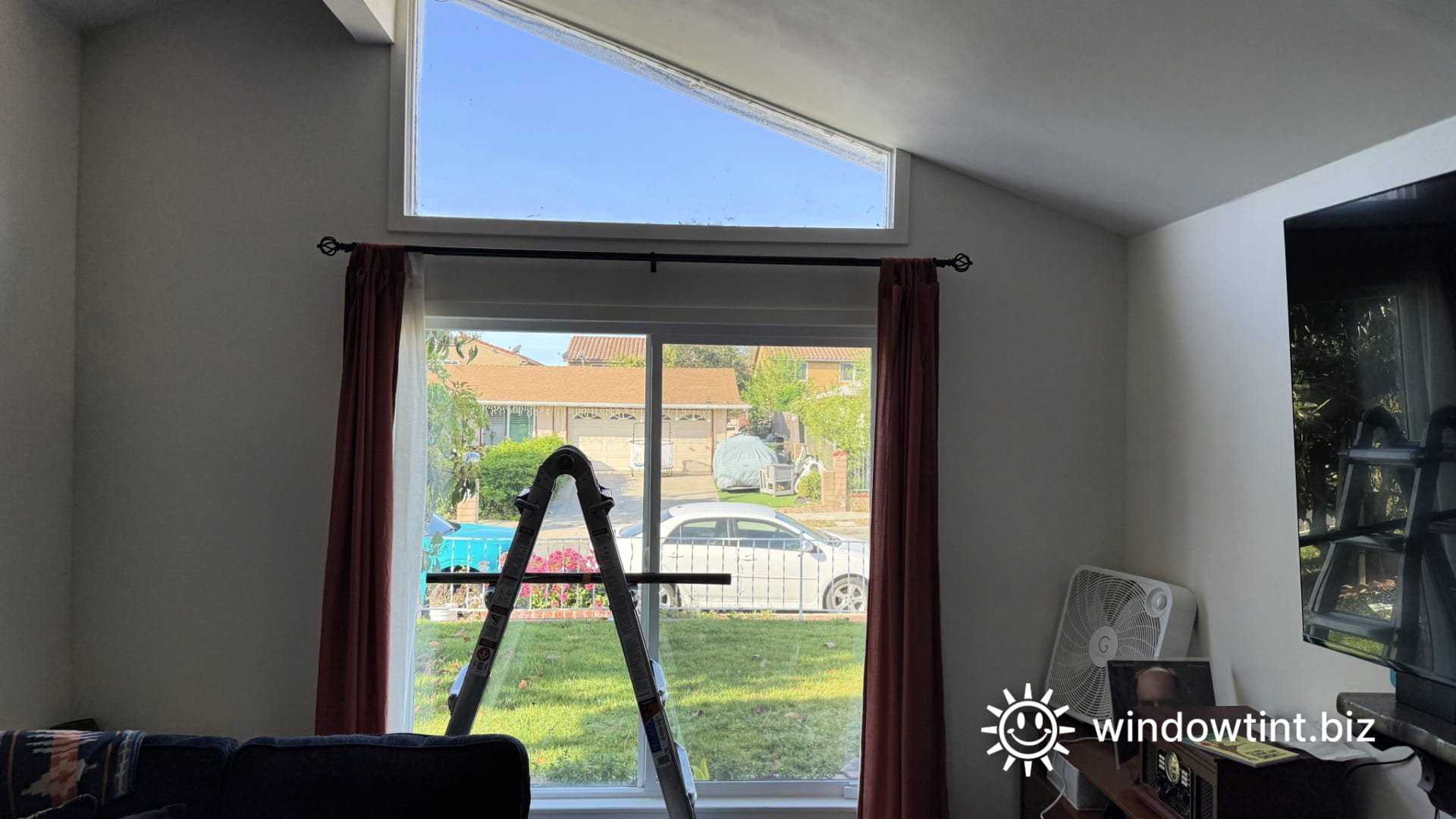 Home window tint installation in Los Angeles living room window for heat reduction and glare control