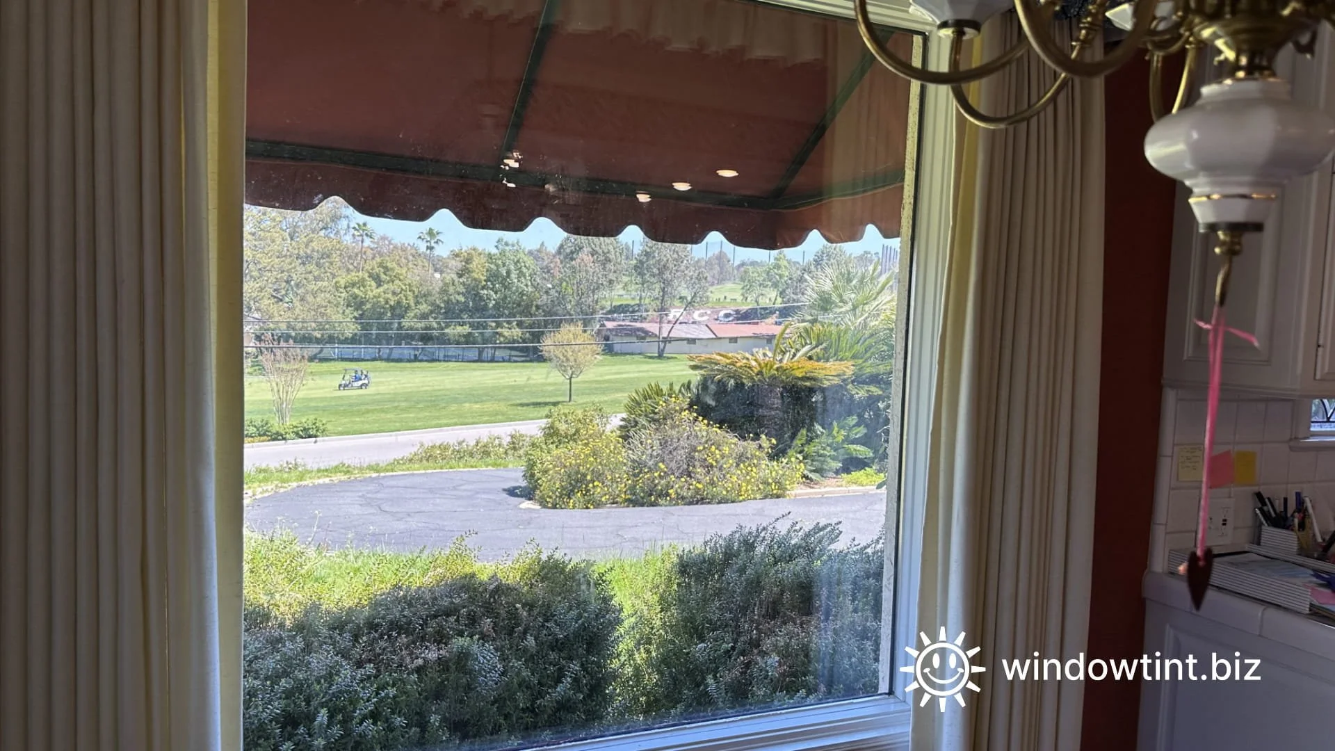 Clear residential window film on dining room windows in Redlands, California providing UV protection and improved comfort without tinting.