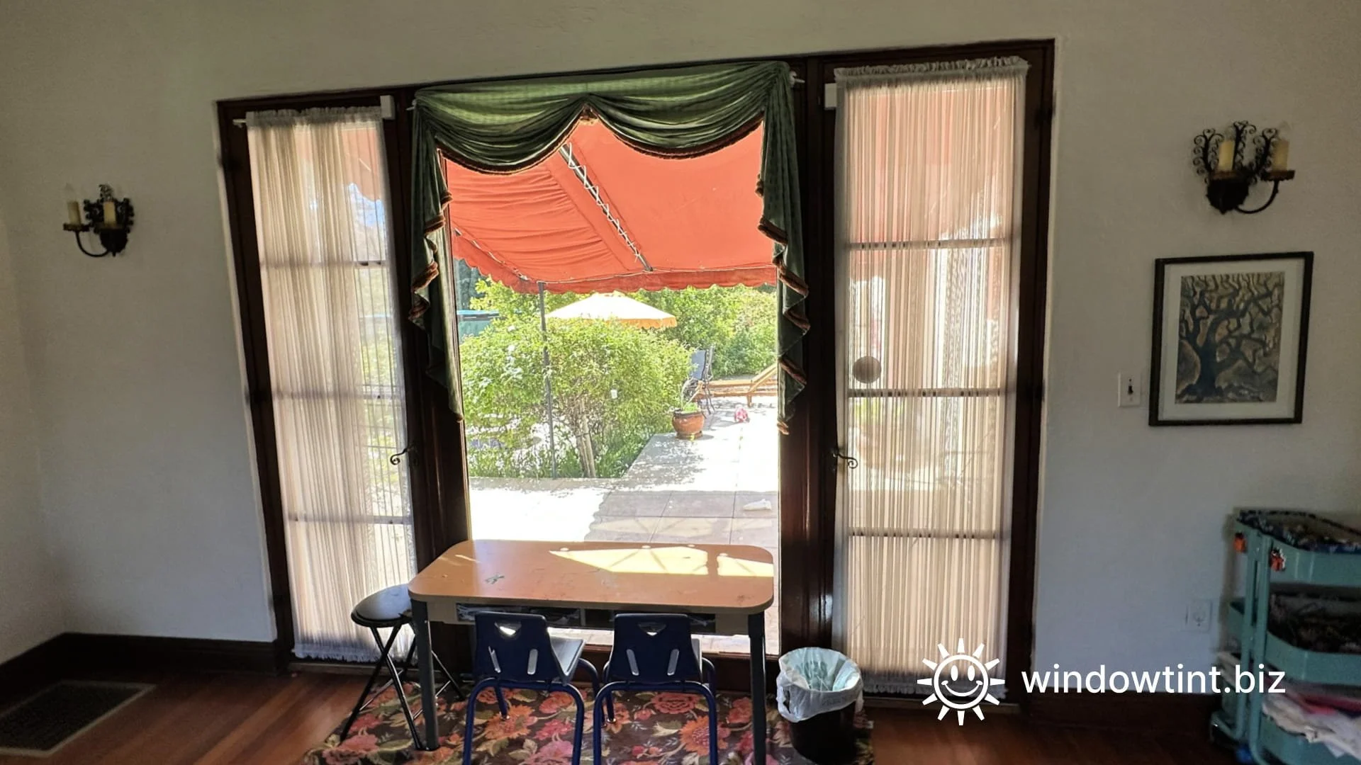 Clear residential window film in a Redlands, CA living room reducing heat and glare while maintaining ocean-facing views and natural light.