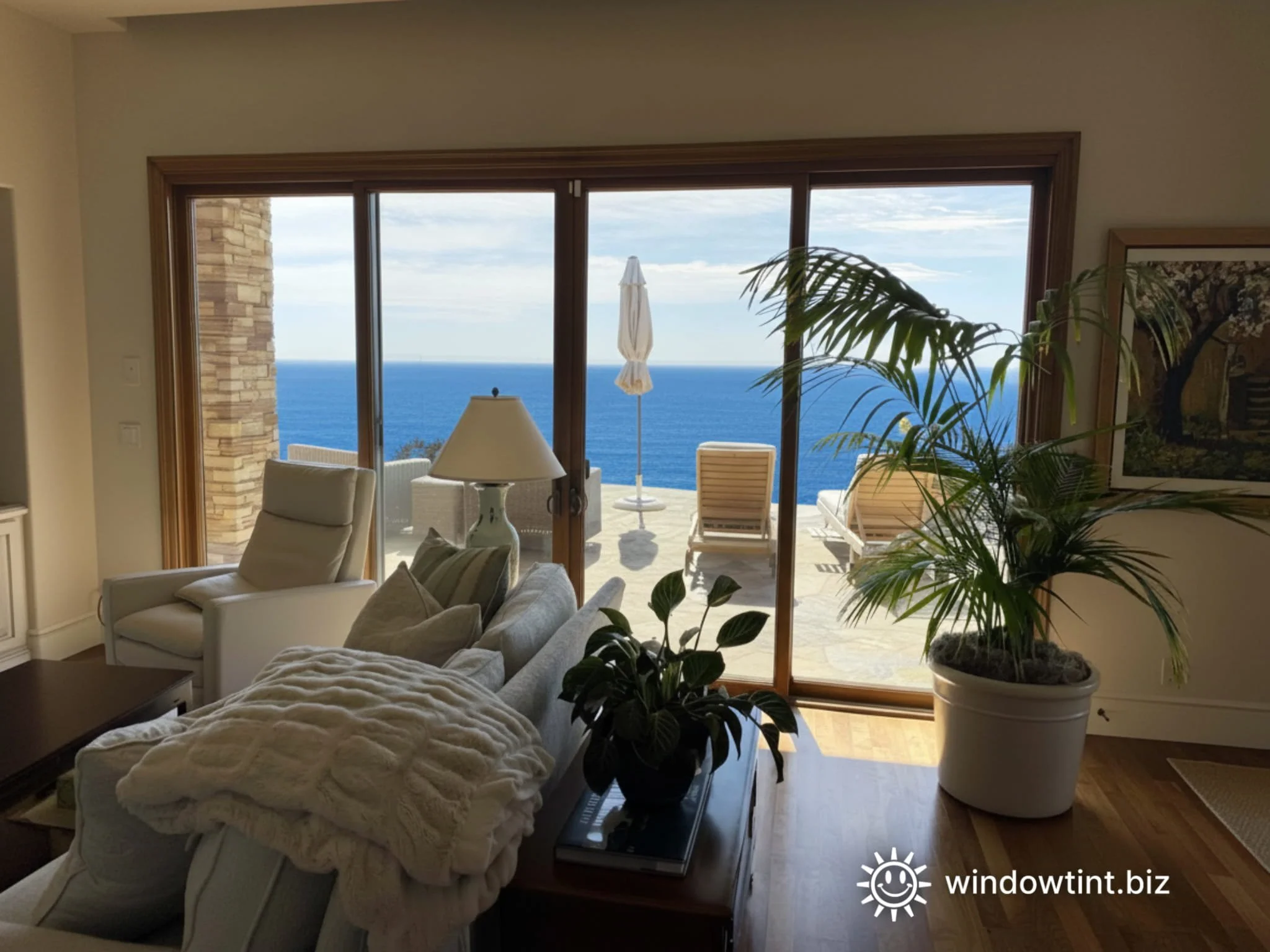 Dana Point coastal home with large sliding glass doors and ocean view, featuring clear security window film installed for safety and break-in protection