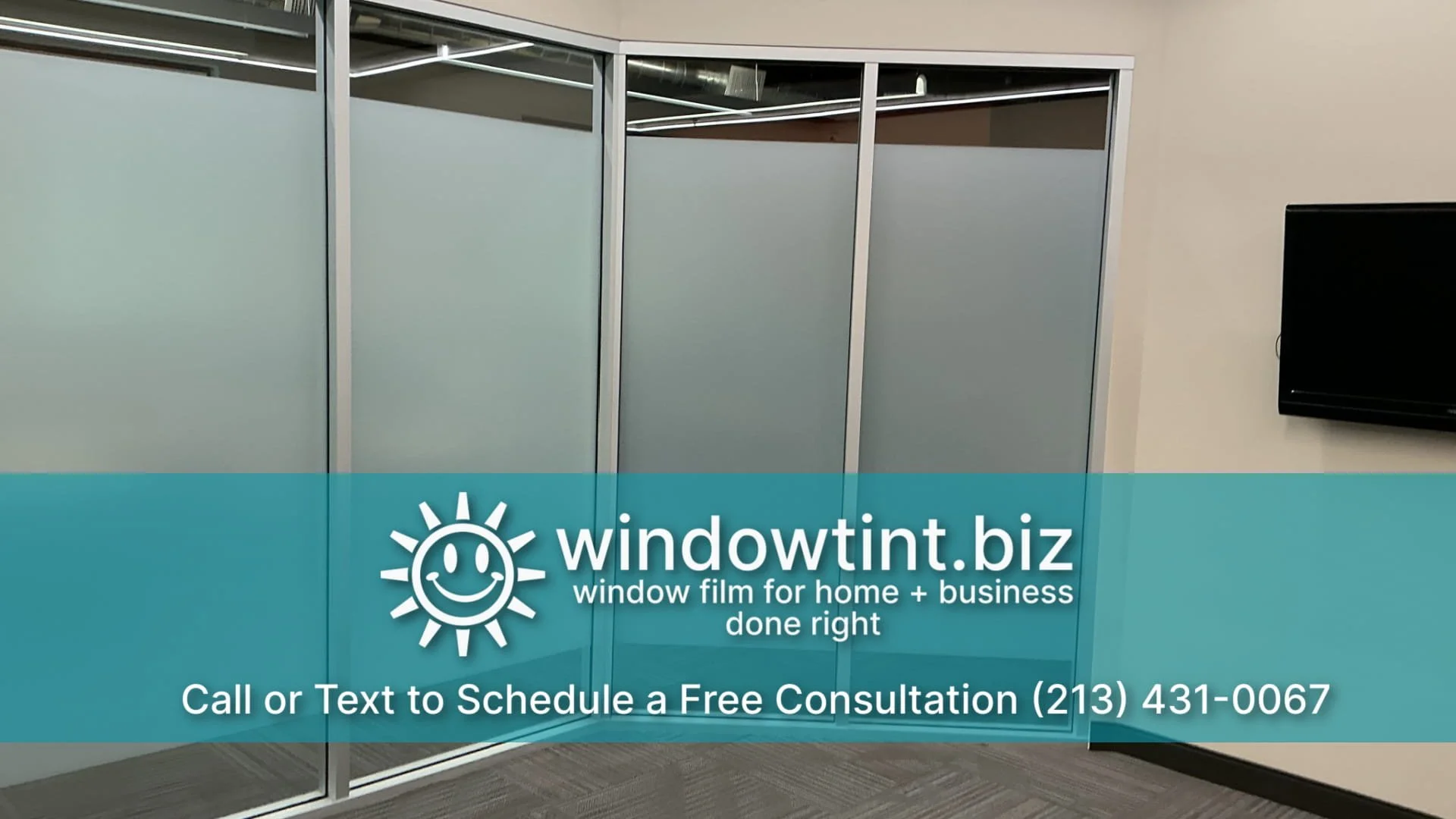 Frosted privacy film installed on a glass office door and surrounding conference room panels