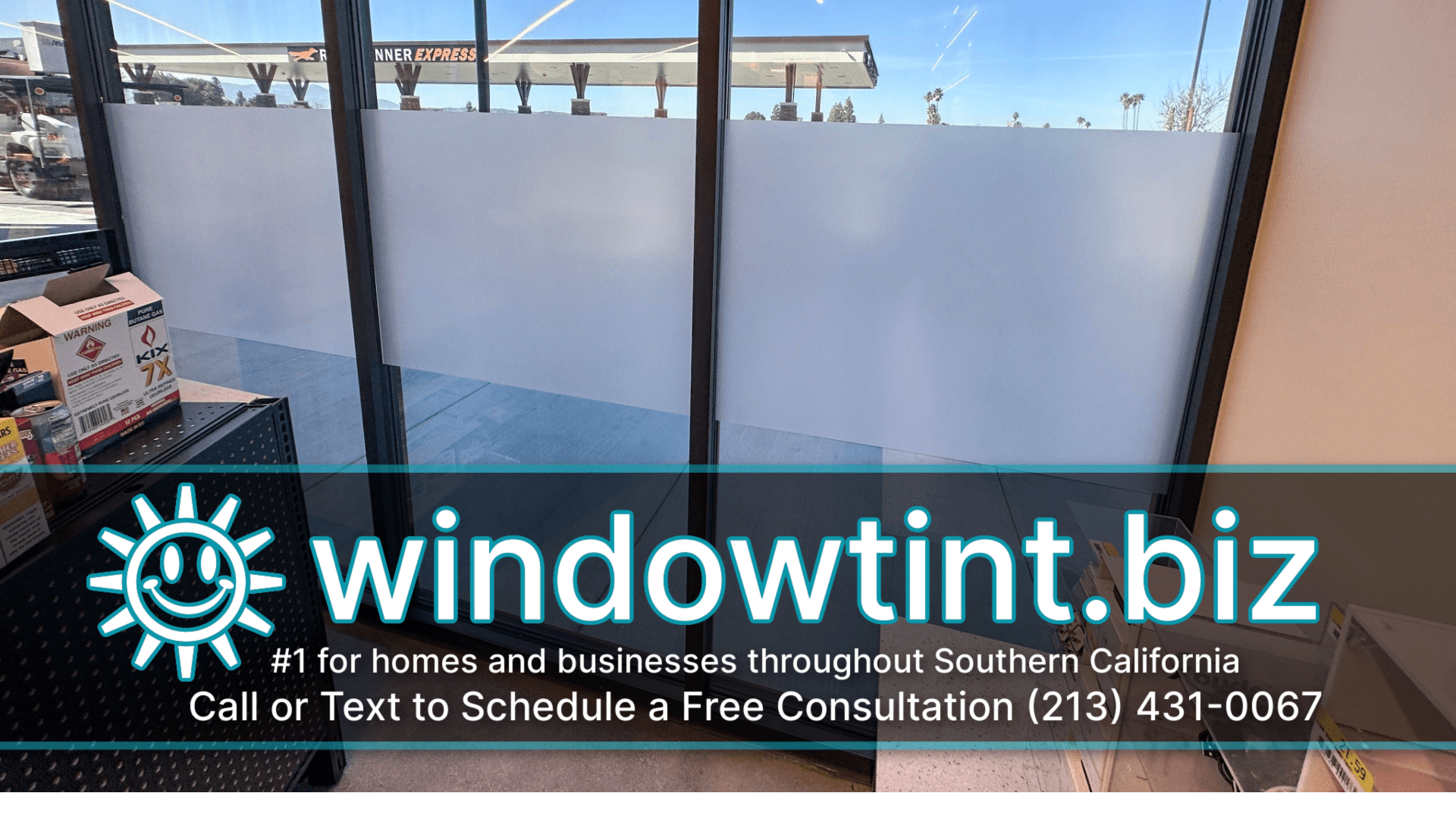 Interior glass with frosted privacy film installed on lower section of window