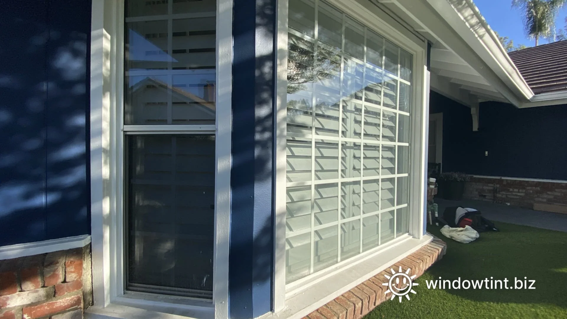 Residential window tint installation on large windows to improve comfort without darkening rooms.