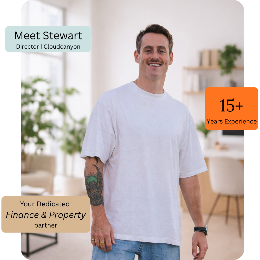 A smiling man in a white t-shirt standing in a bright room with plants and shelves, with overlays introducing Stewart as director at Cloudcanyon with over 15 years of experience, and indicating he is a dedicated finance and property partner.