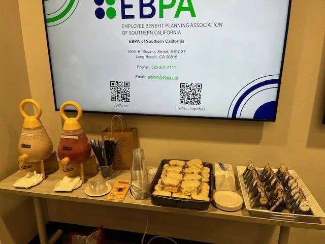 table with sandwiches and rice balls for group catering event