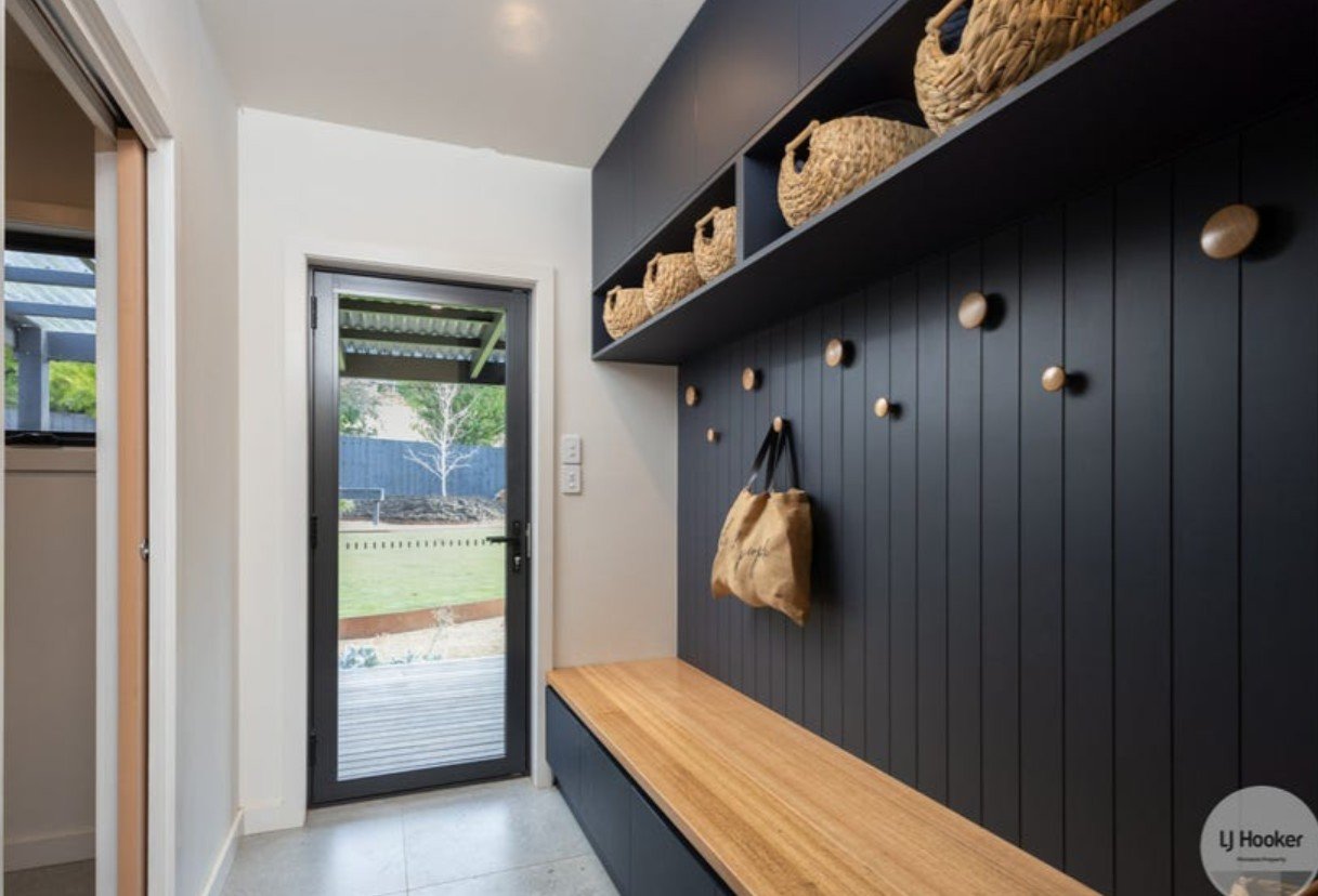 Mudroom storage and timber detailing at the Flowerpot residence
