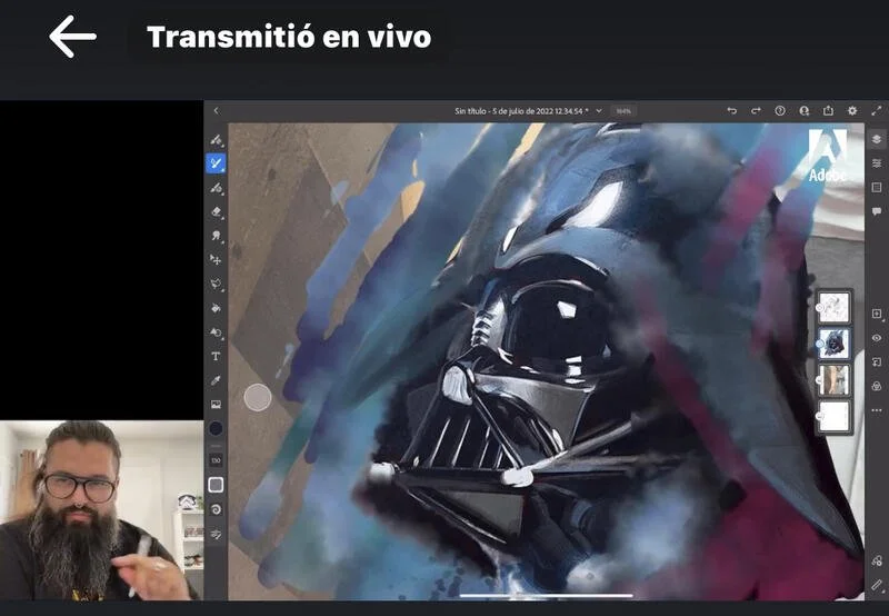 Digital painting of Darth Vader's helmet from Star Wars on a tablet screen, with an artist presenting in the corner.
