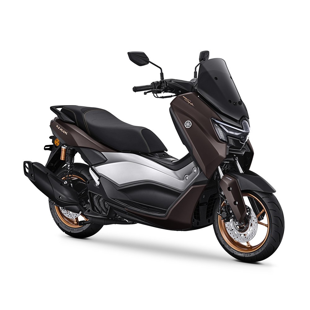A modern Yamaha maxi scooter with a brown and black color scheme, featuring a comfortable seat, large front windshield, and alloy wheels.