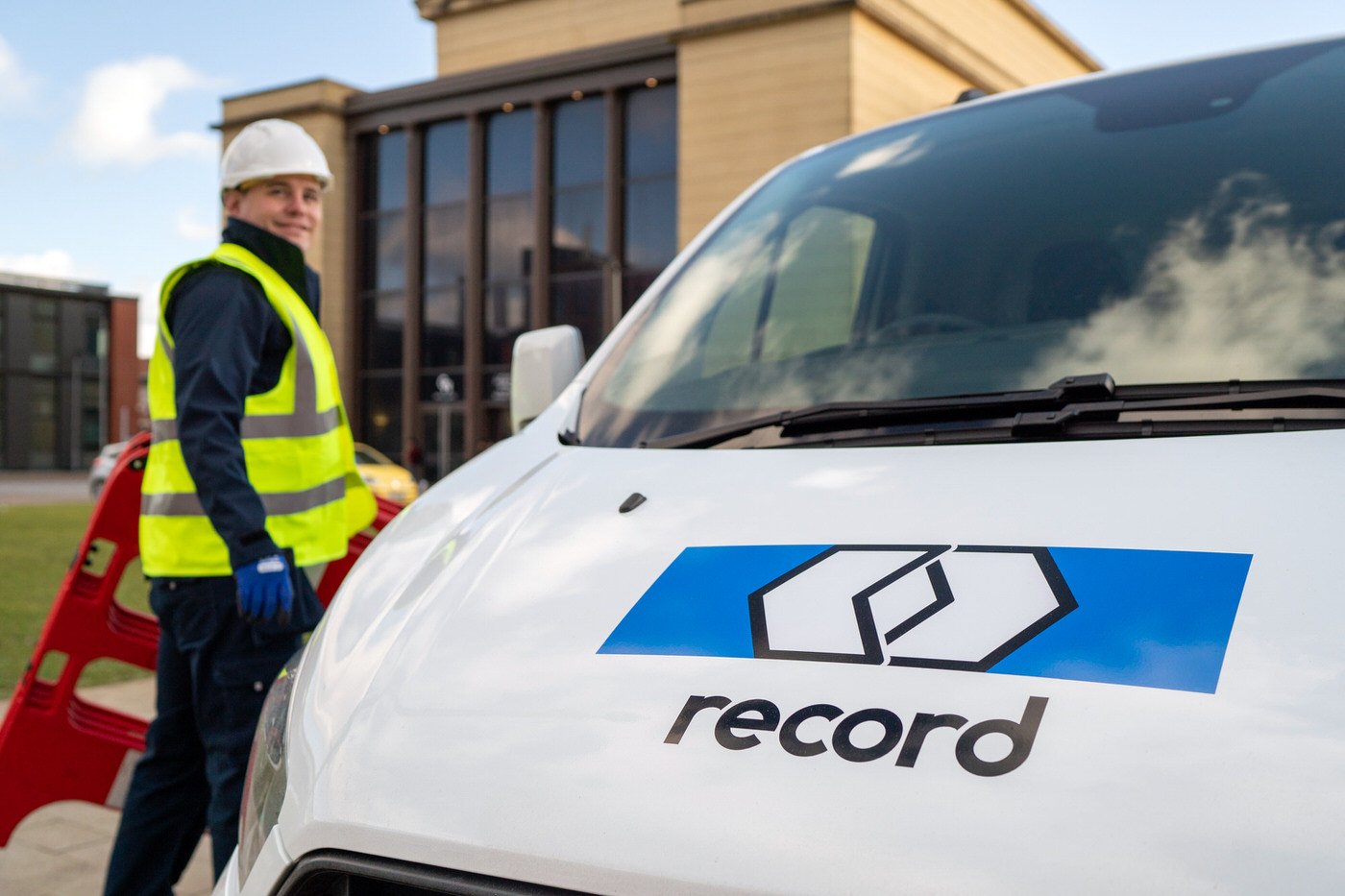 Business photography for Record at Swansea University, with a worker in a high vis out of focus in the background.