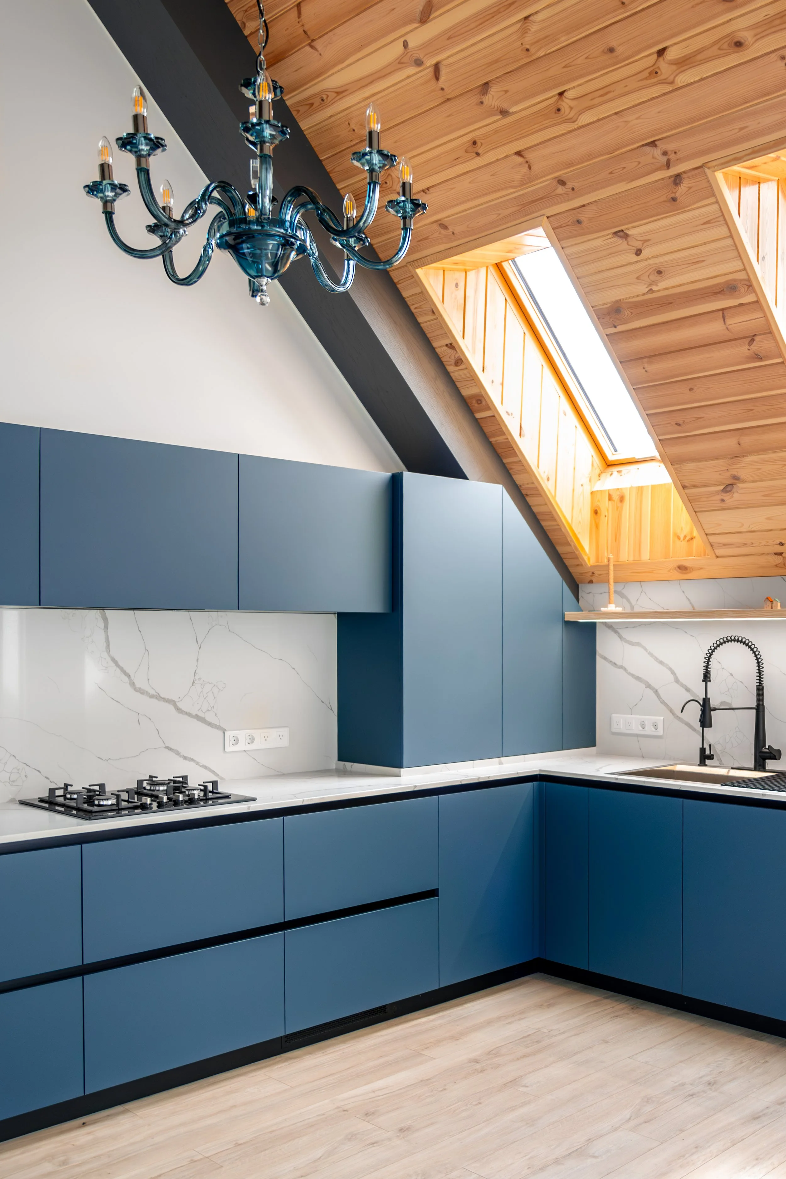 blue-kitchen-fronts-glass-chandelier-attic-light.jpg