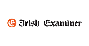 Logo of the Irish Examiner newspaper with orange and black text.
