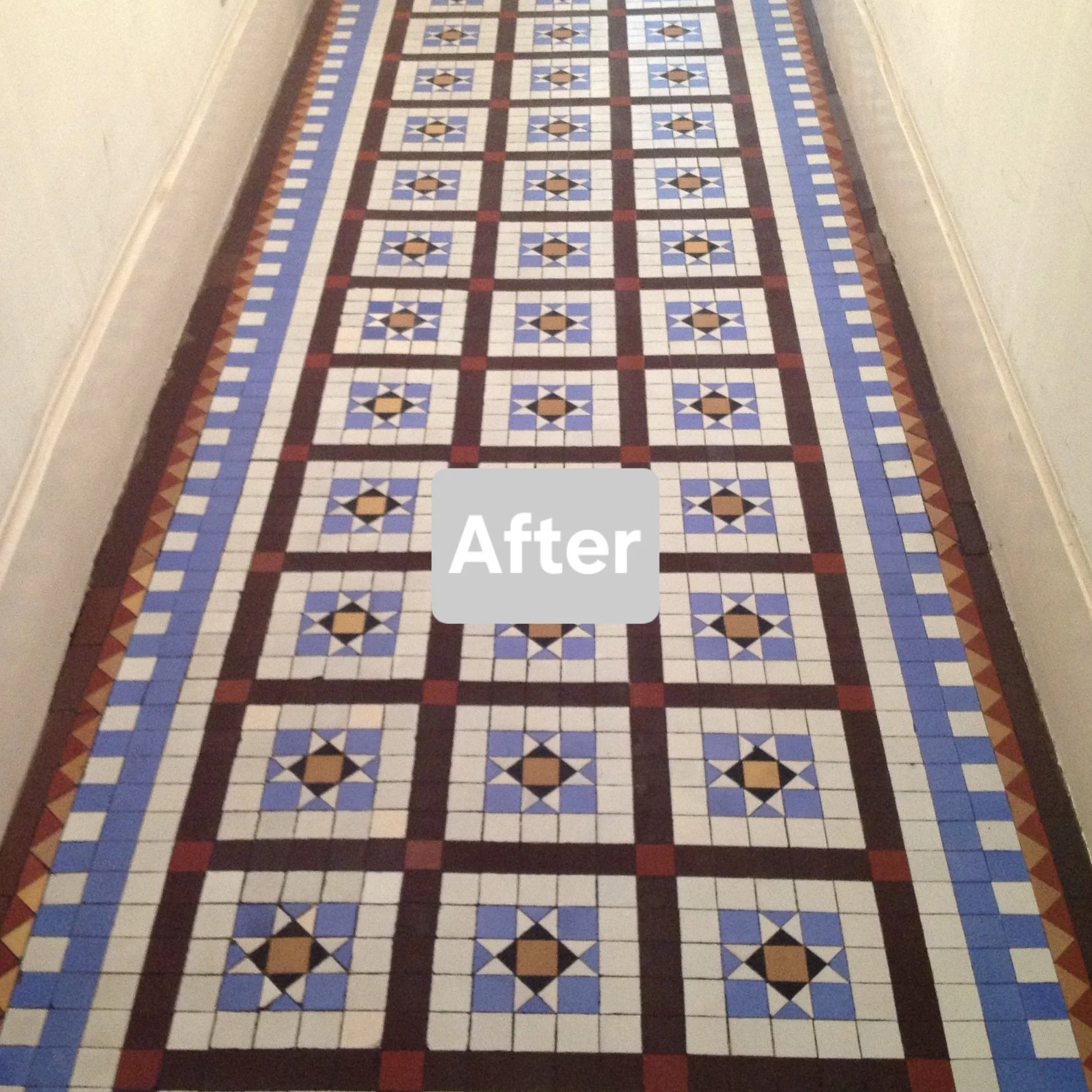Newly renovated colorful geometric patterned tile hallway floor with a label that says 'After'