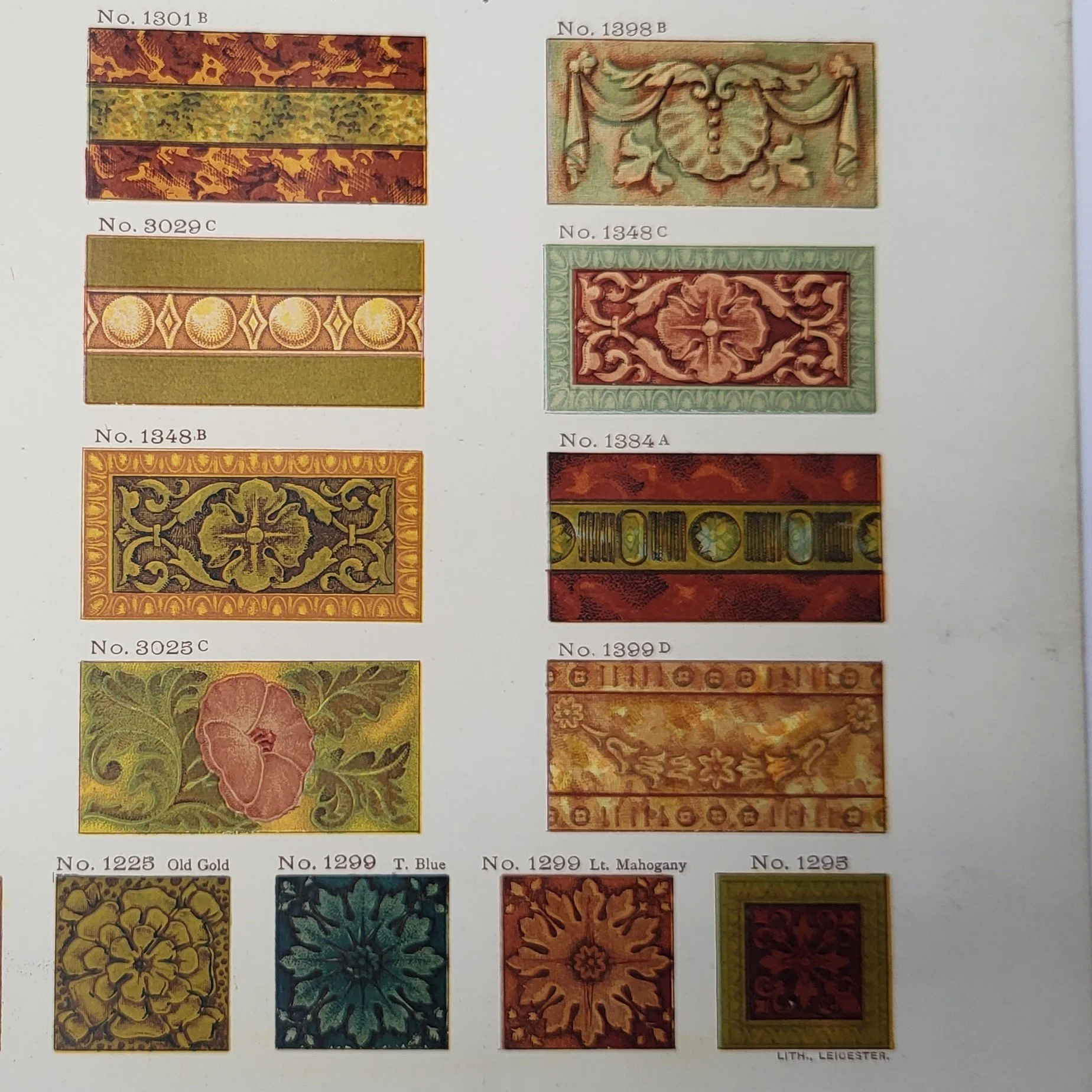 Collection of decorative art tiles with various patterns and vintage design elements, labeled with catalog numbers and different color themes.