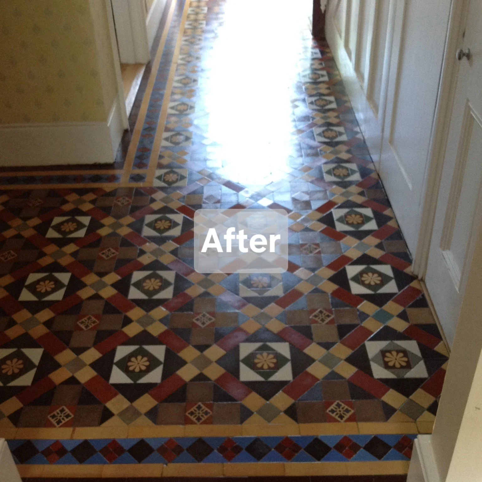 Photo of a hallway floor with vintage patterned tiles in geometric designs and colors, with a bright light at the end and an 'After' label over the floor.