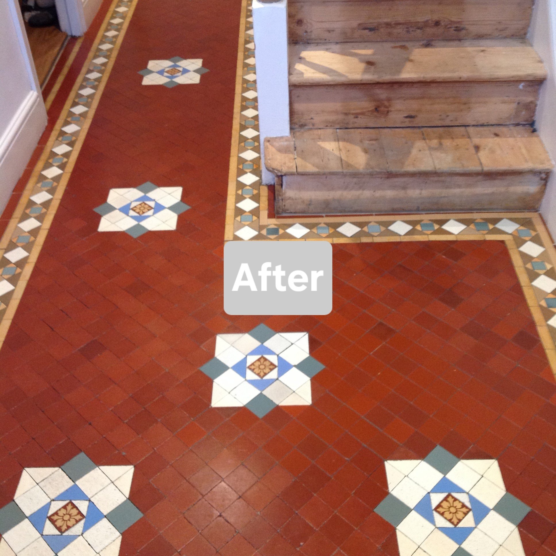 Refinished vintage red and patterned tile floor next to wooden stairs with marked 'After' label.