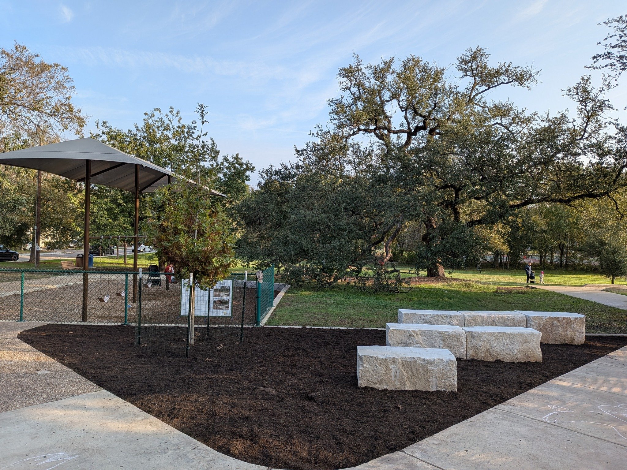 Photograph showing limestone blocks and a new tree installed at Austin's Shipe Park