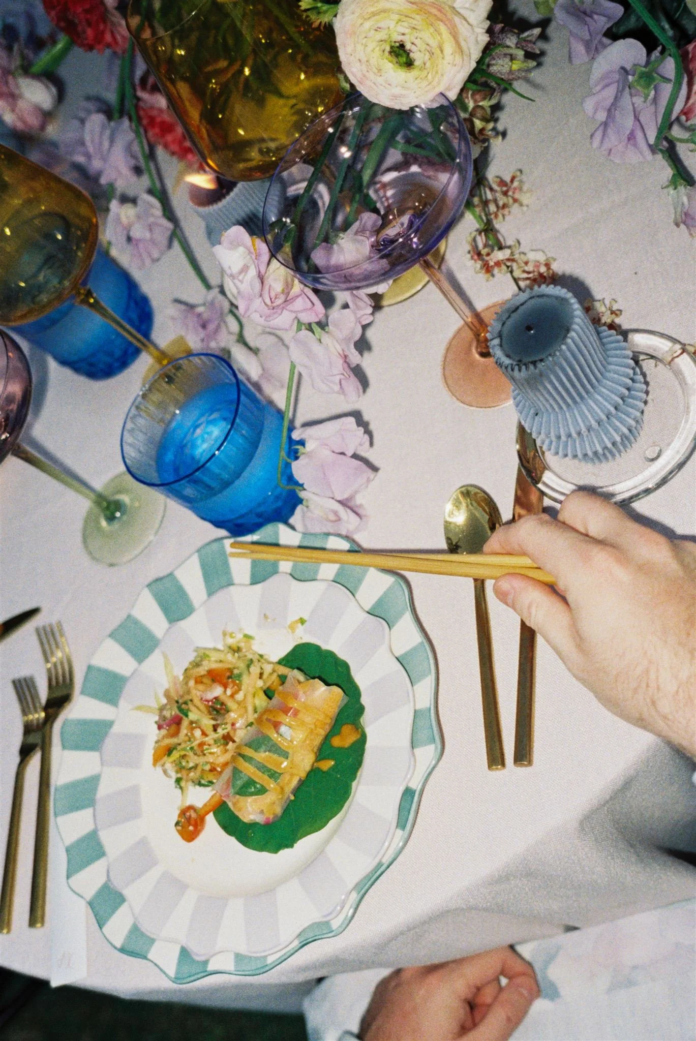 reception dinner with pink sweet peas Kauai wedding