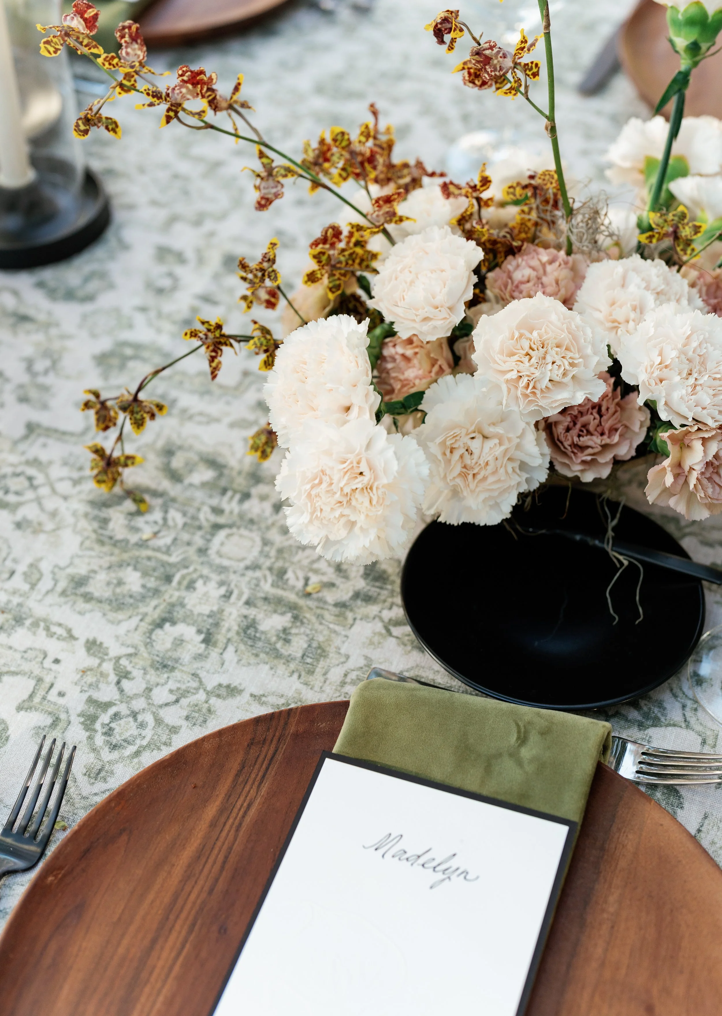 lush fall arrangement at wedding reception tables cape orchids