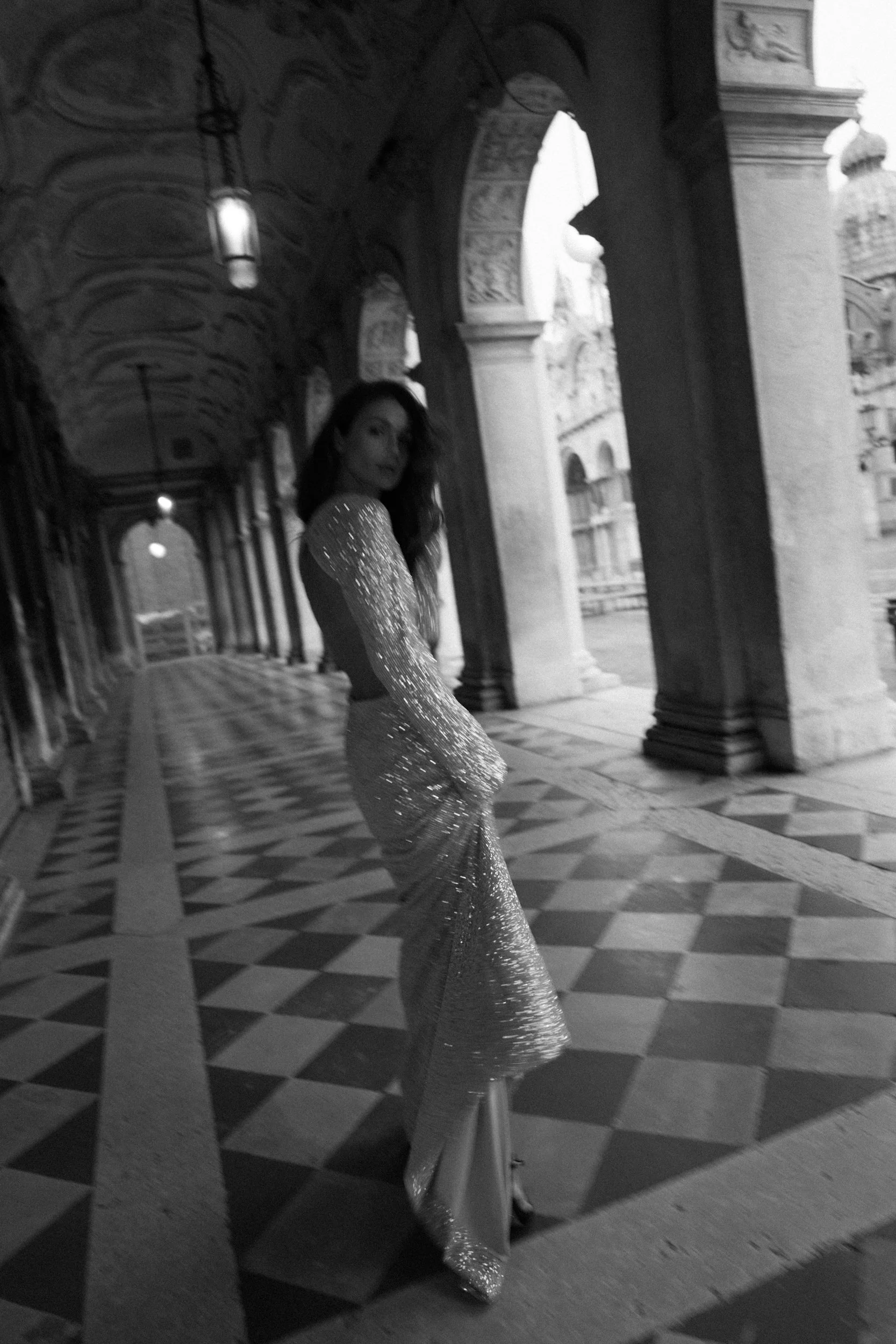 bride in couture gown walking in Venetian streets