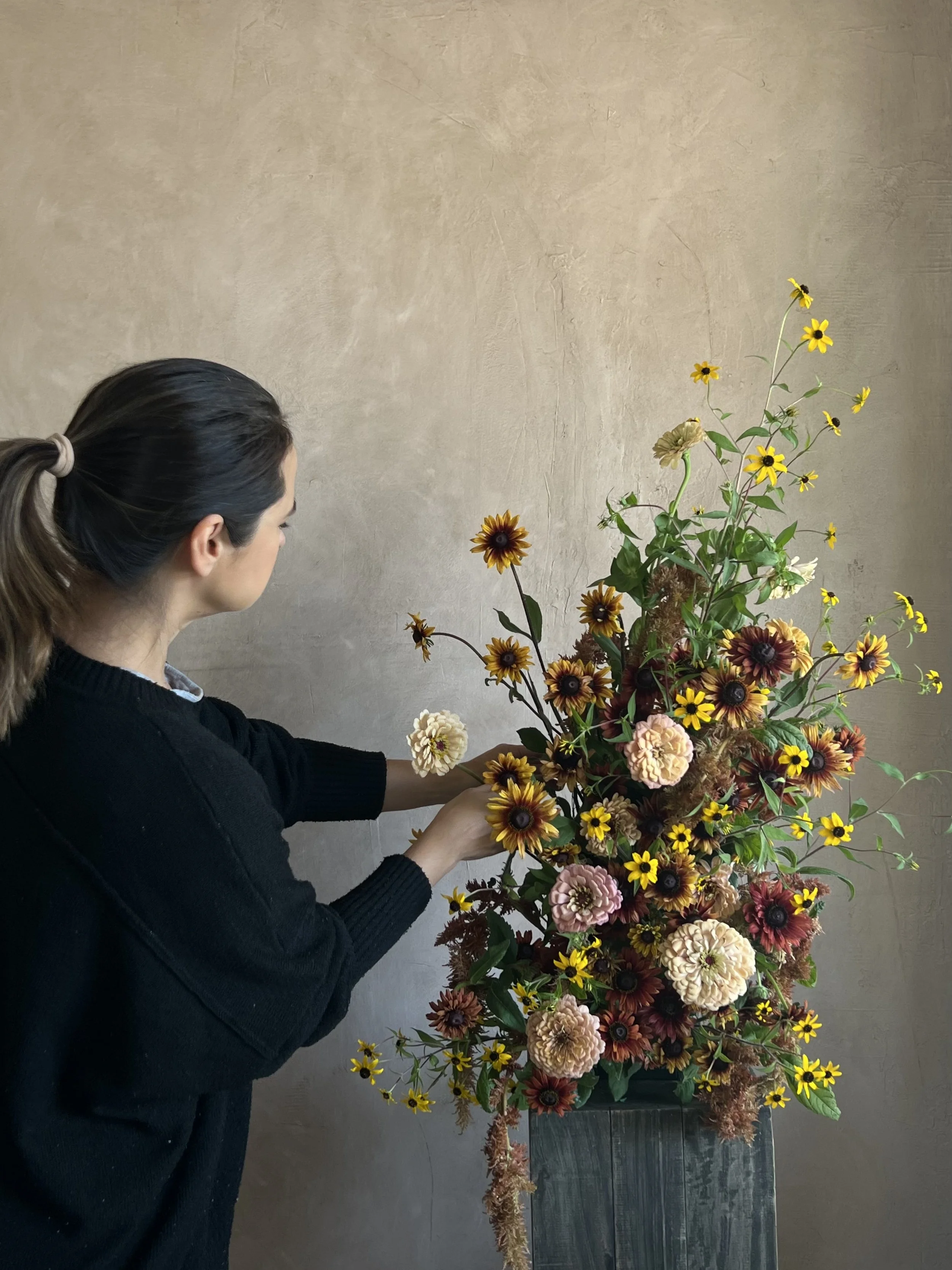 Floral design sunflower and taupe floral sculpture for wedding