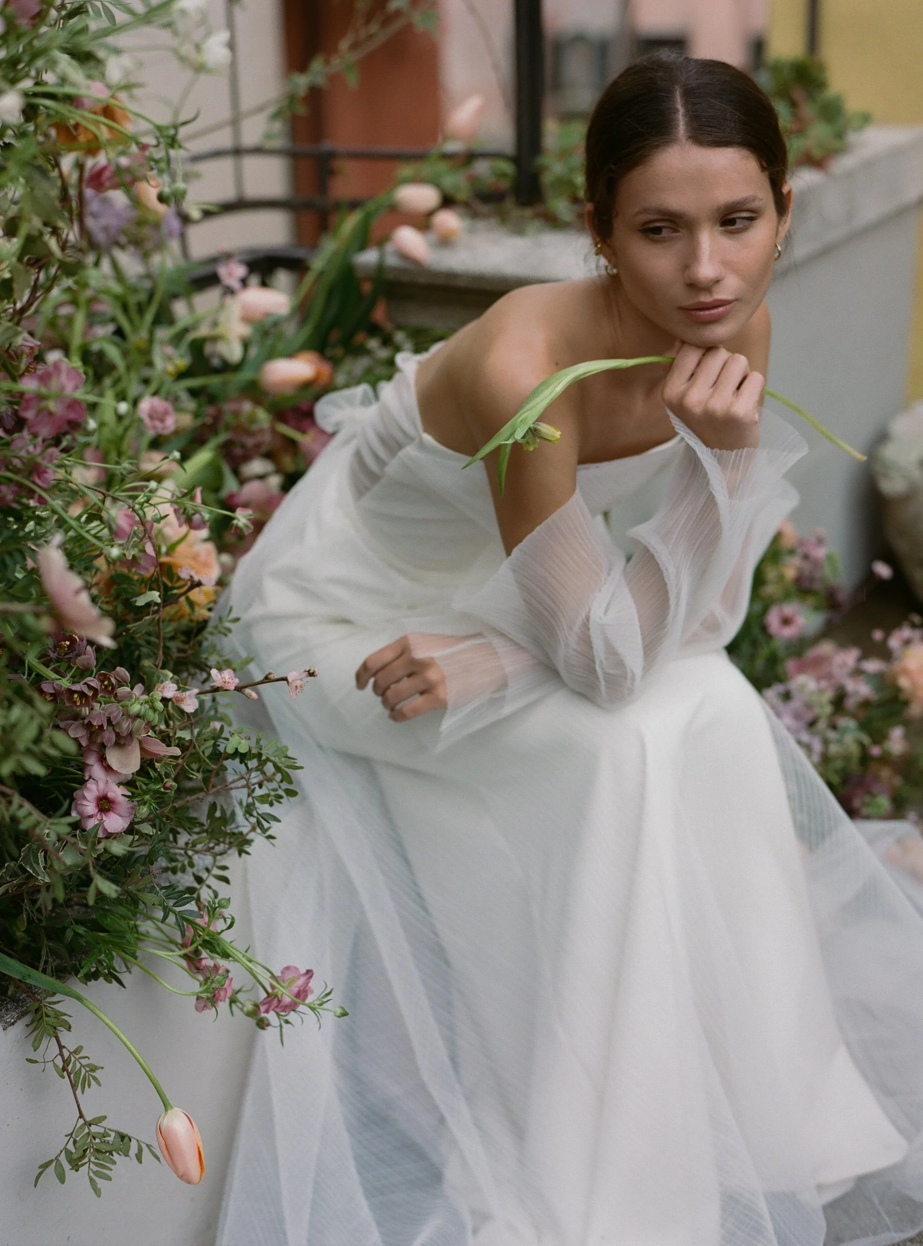 Venice Italy Wedding bride with a mauve and pink floral installation around her