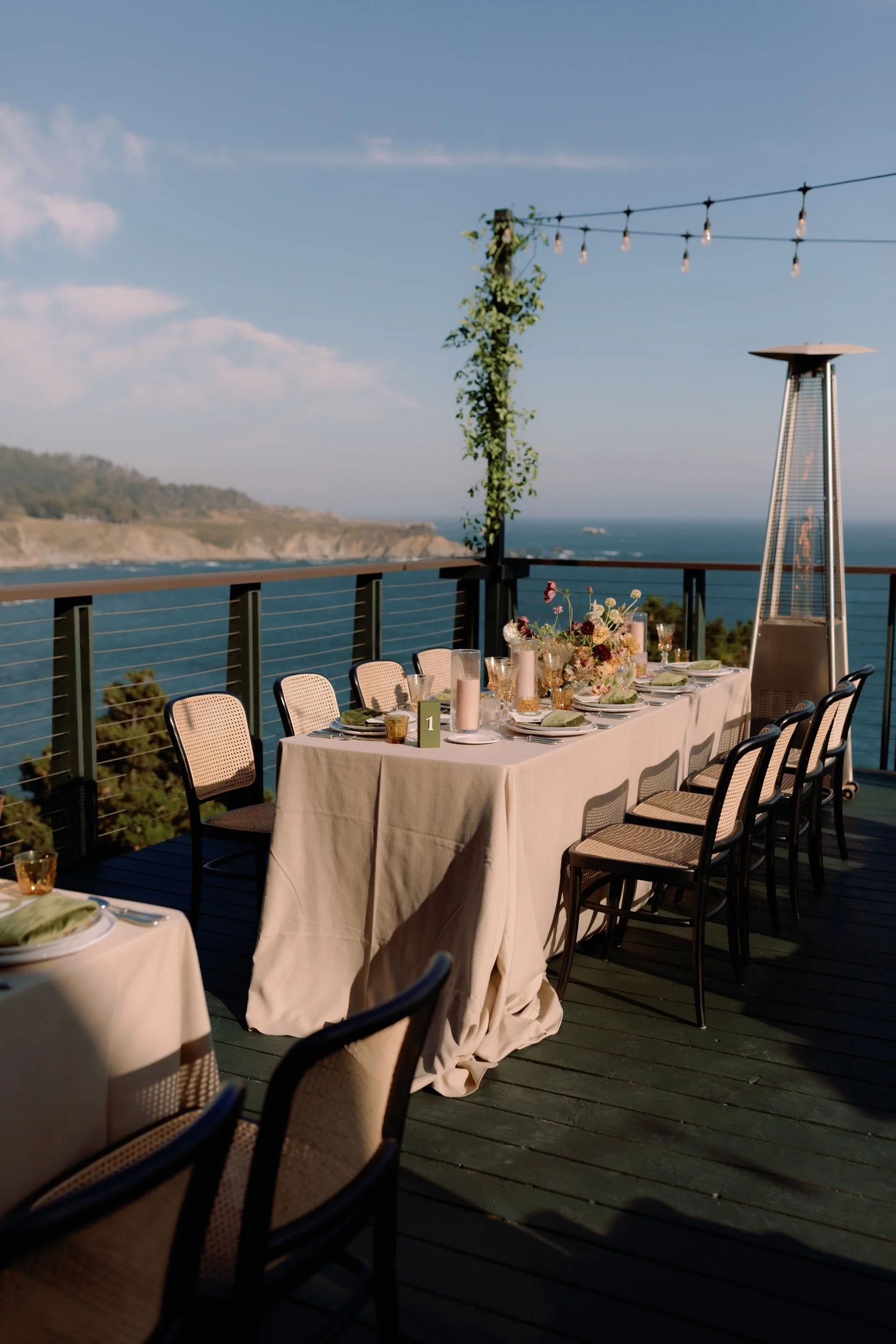 greenery on poles at Timber Cove wedding