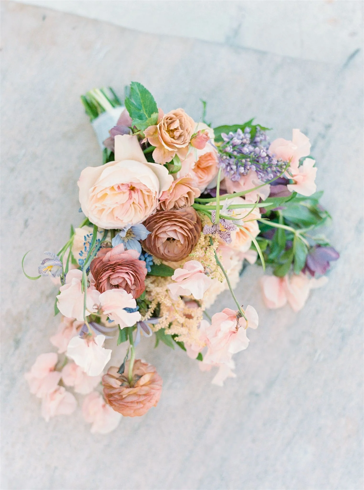 luxury spring bridal bouquet ranunculus sweet pea