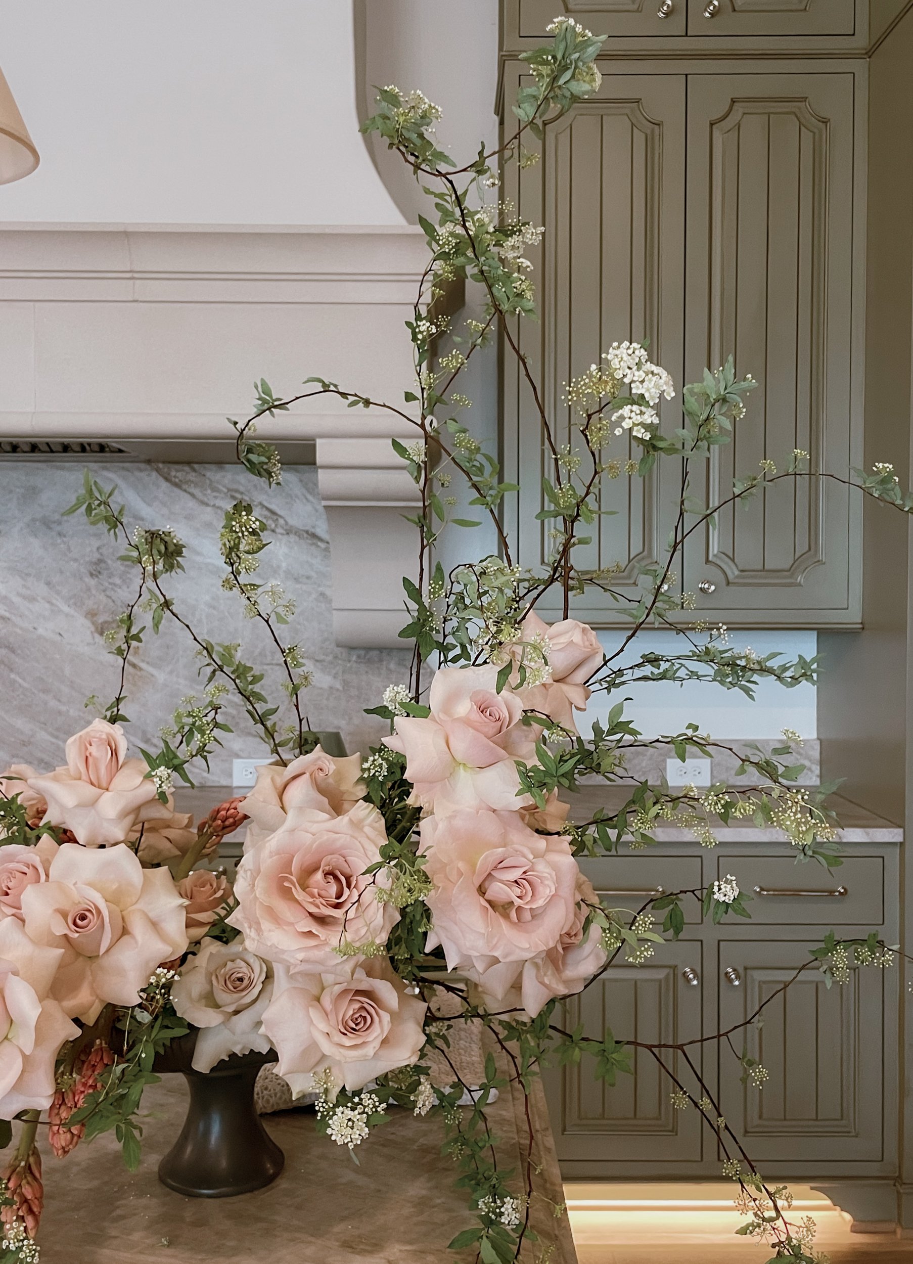nude florals in vase in kitchen