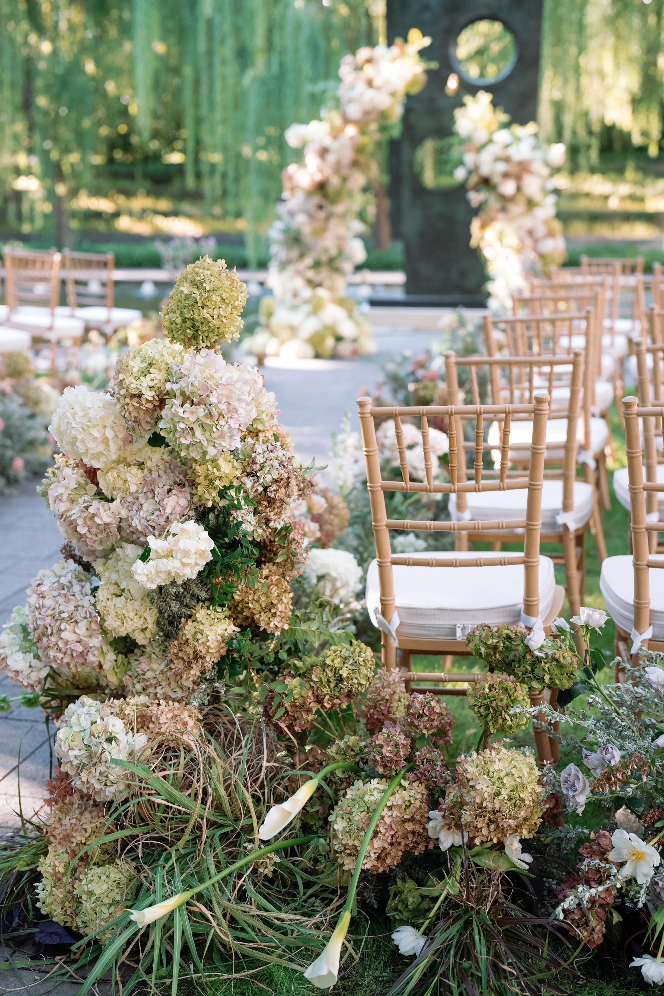wedding ceremony flowers with floral installation oakleaf hydrangeas Nasher Sculpture Center