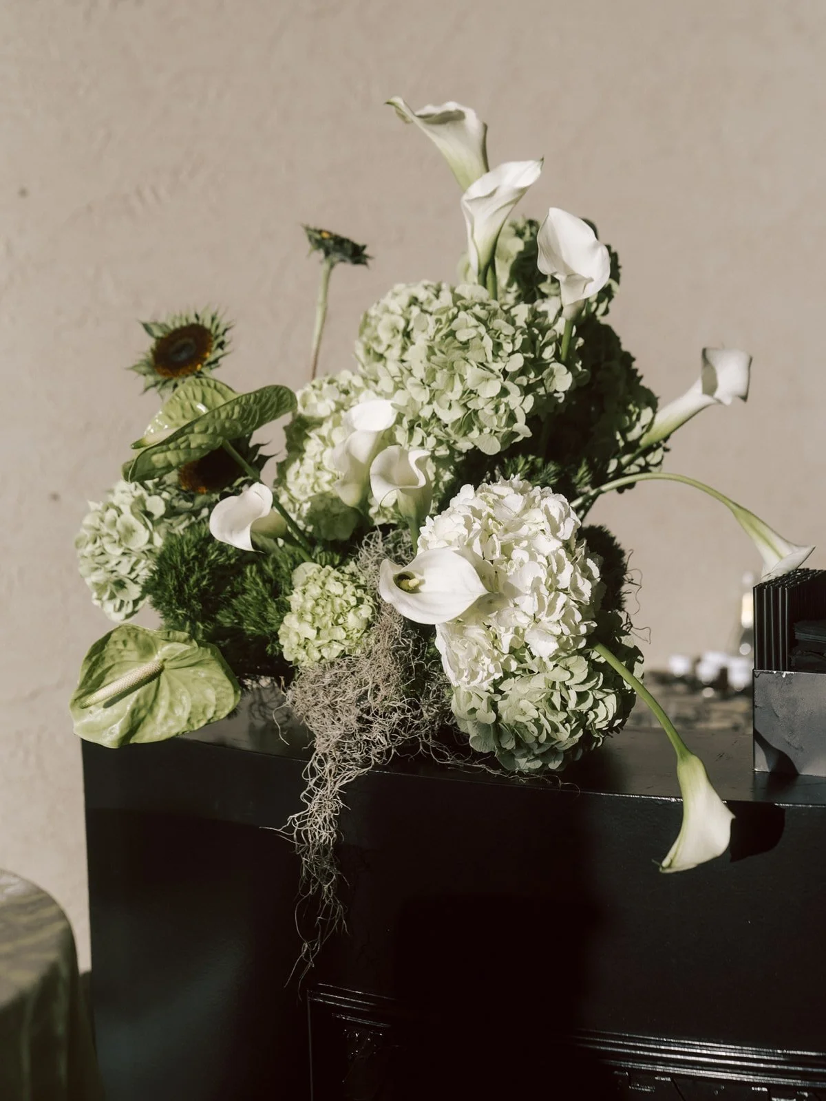 green hydrangea white calla lilies bar arrangement wedding