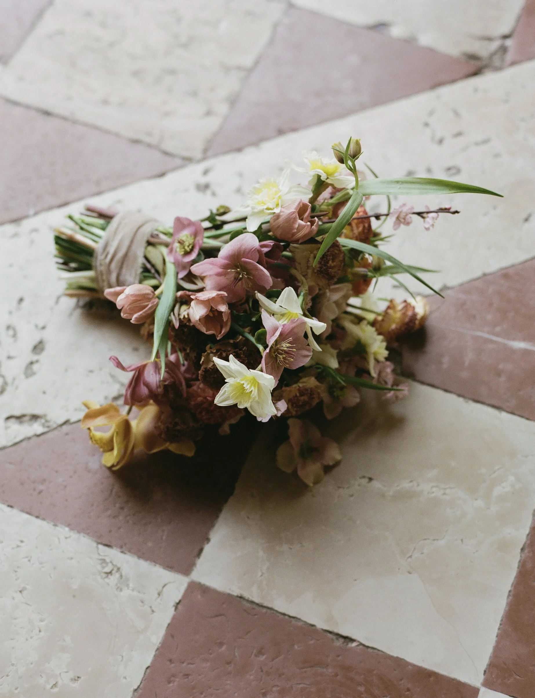 Bridal bouquet with hellebore and daffodils in Venice, Italy