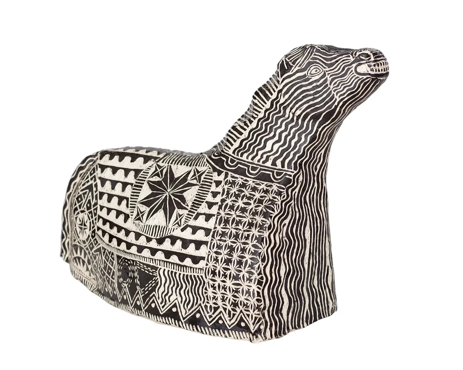 Black and white decorative horse sculpture with intricate geometric patterns.
