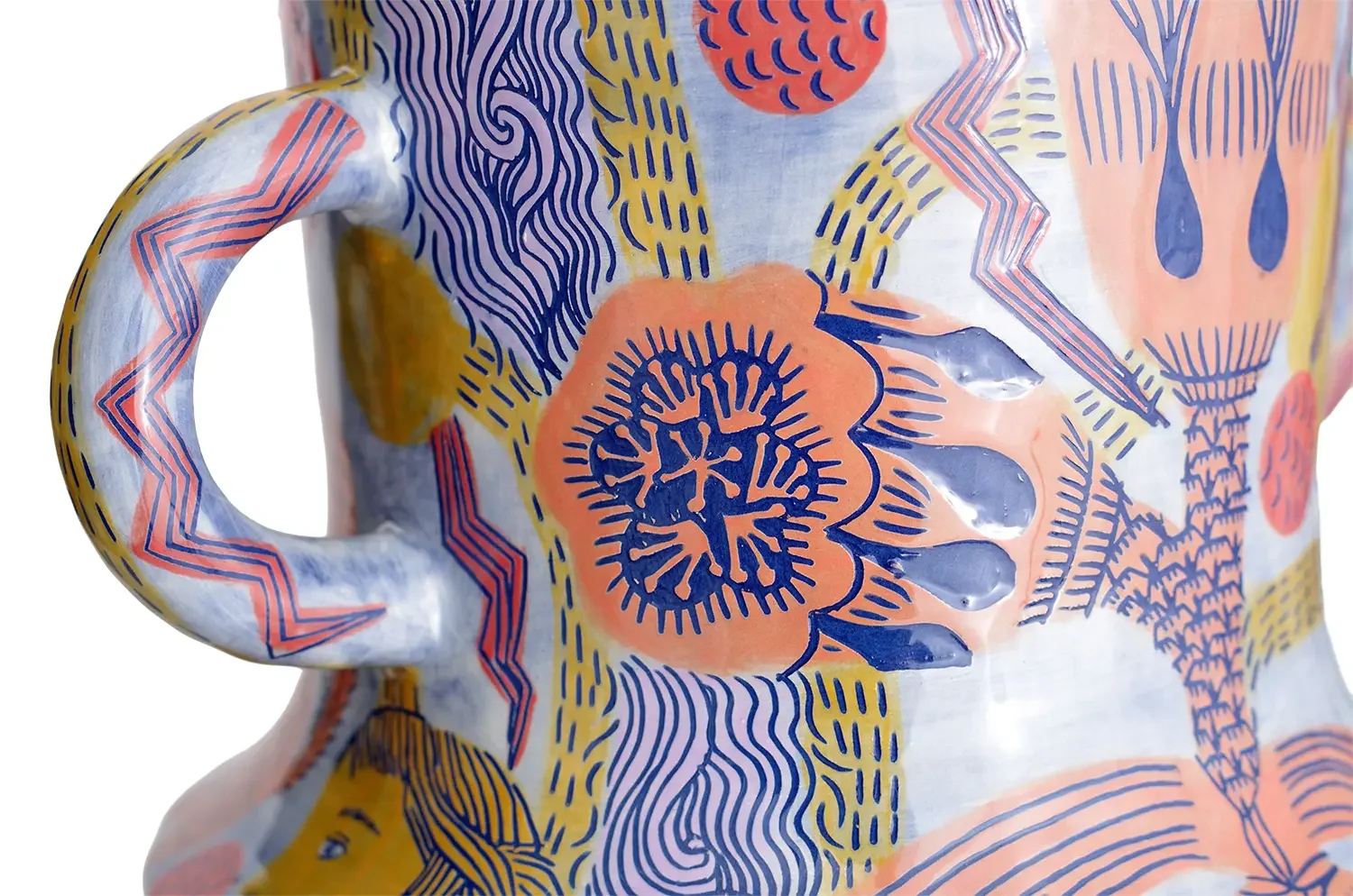Close-up of a decorated ceramic vase with colourful abstract patterns in blue, yellow, orange, and pink.
