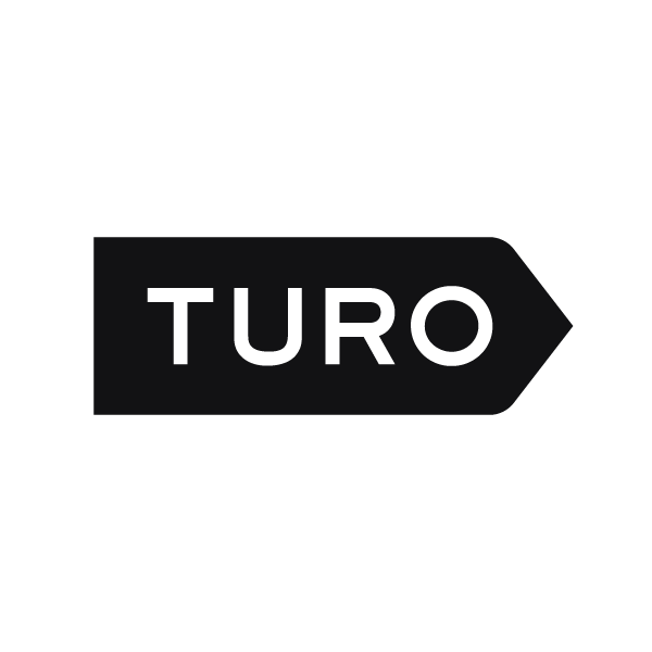 Black arrow sign with the word "TURO" in white letters, pointing to the right.
