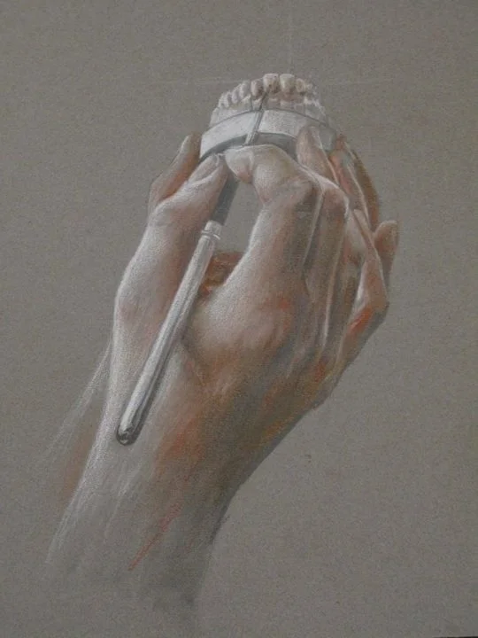 A realistic painting of a hand holding a brain, with a paintbrush touching the brain.