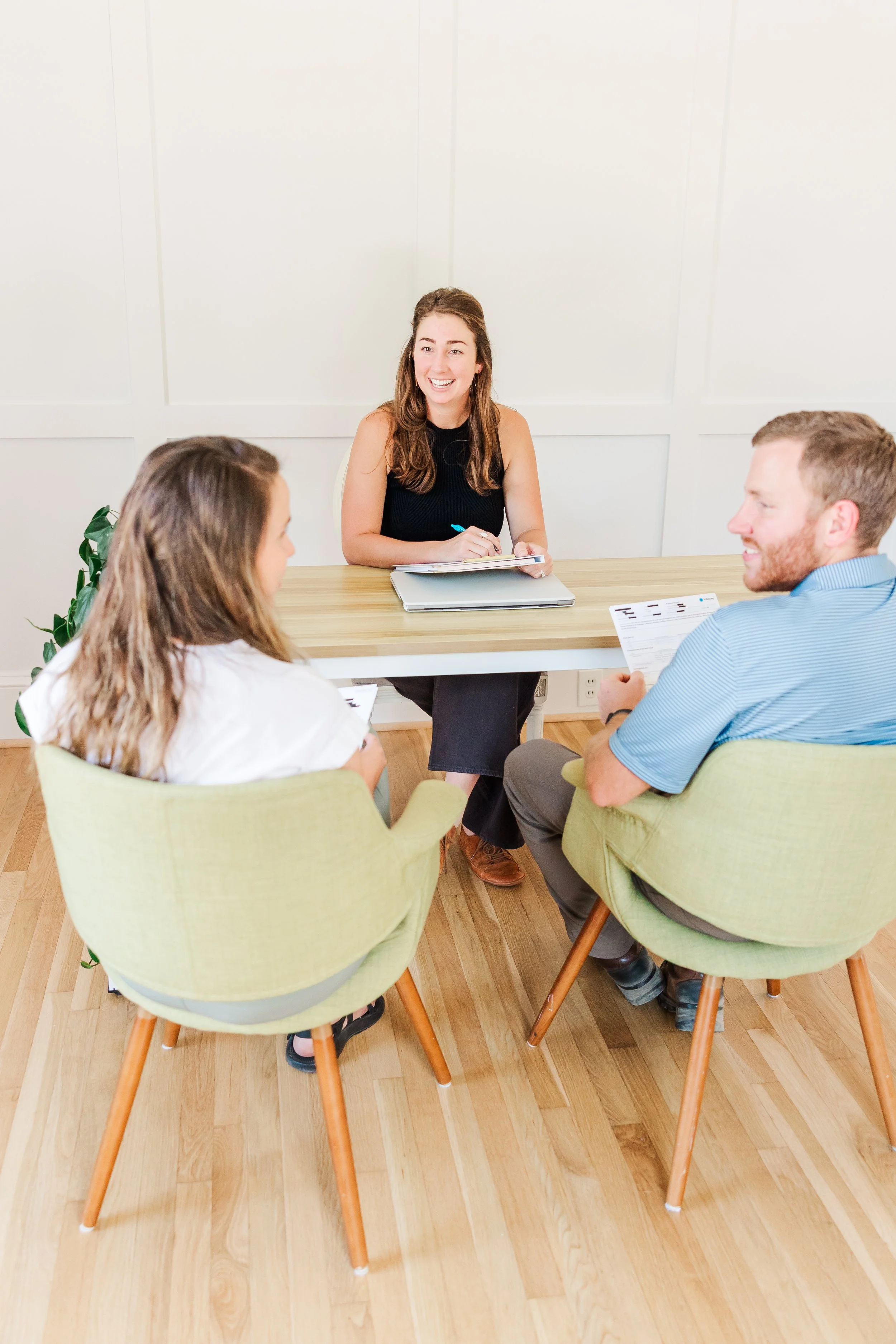 Dr. Olivia Tucker consulting with a couple on preconception and fertility strategy