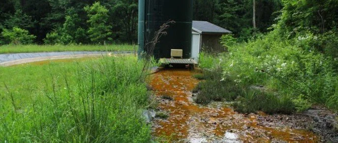 Acid mine runoff, orange stream