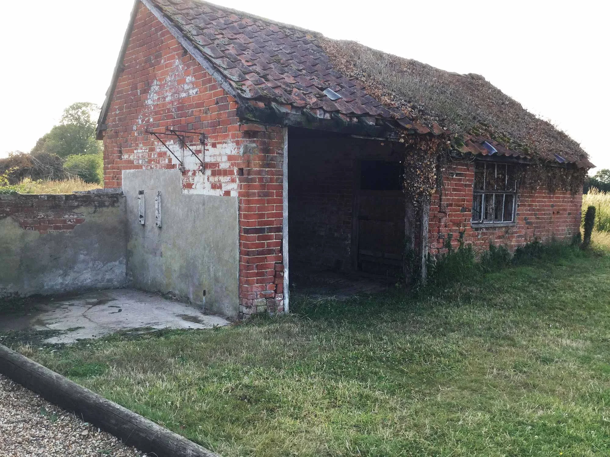Original dairy barn before renovation.
