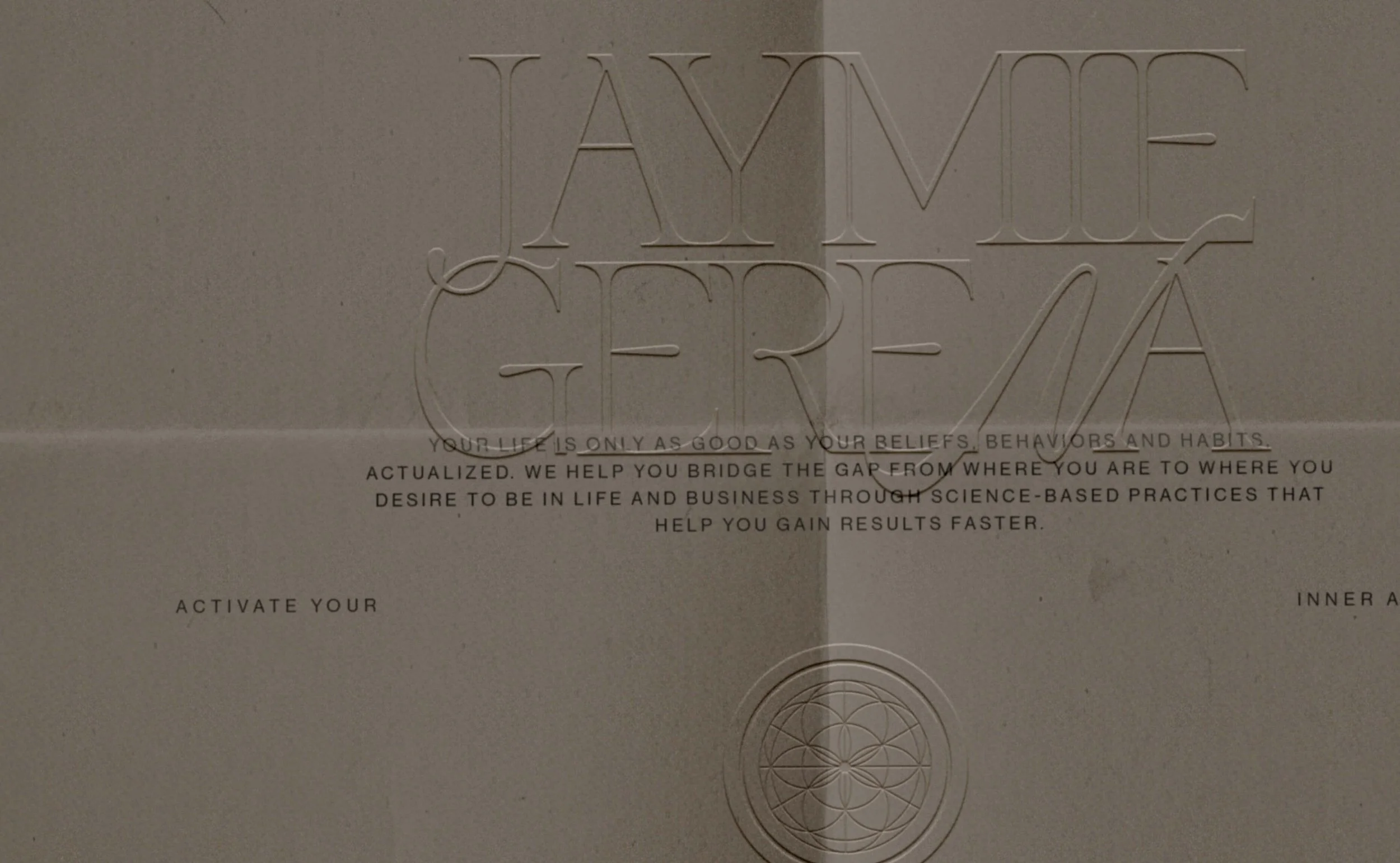 Close up paper mockup rendering with embossed Jaymie Gerena logo wordmark and text - studio domka - personal branding studio